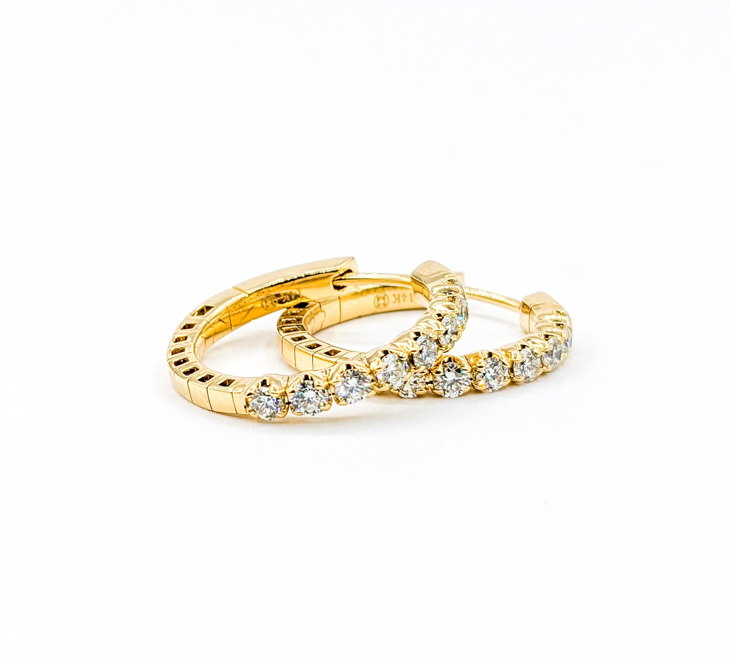 .95ctw Diamond Hoop Earrings

These gorgeous earrings, crafted meticulously in 14k yellow gold, showcase dazzling hoop designs, adorned with an impressive .95ctw diamonds. The sparkling diamonds boast a clarity of SI1 and a radiant H color,