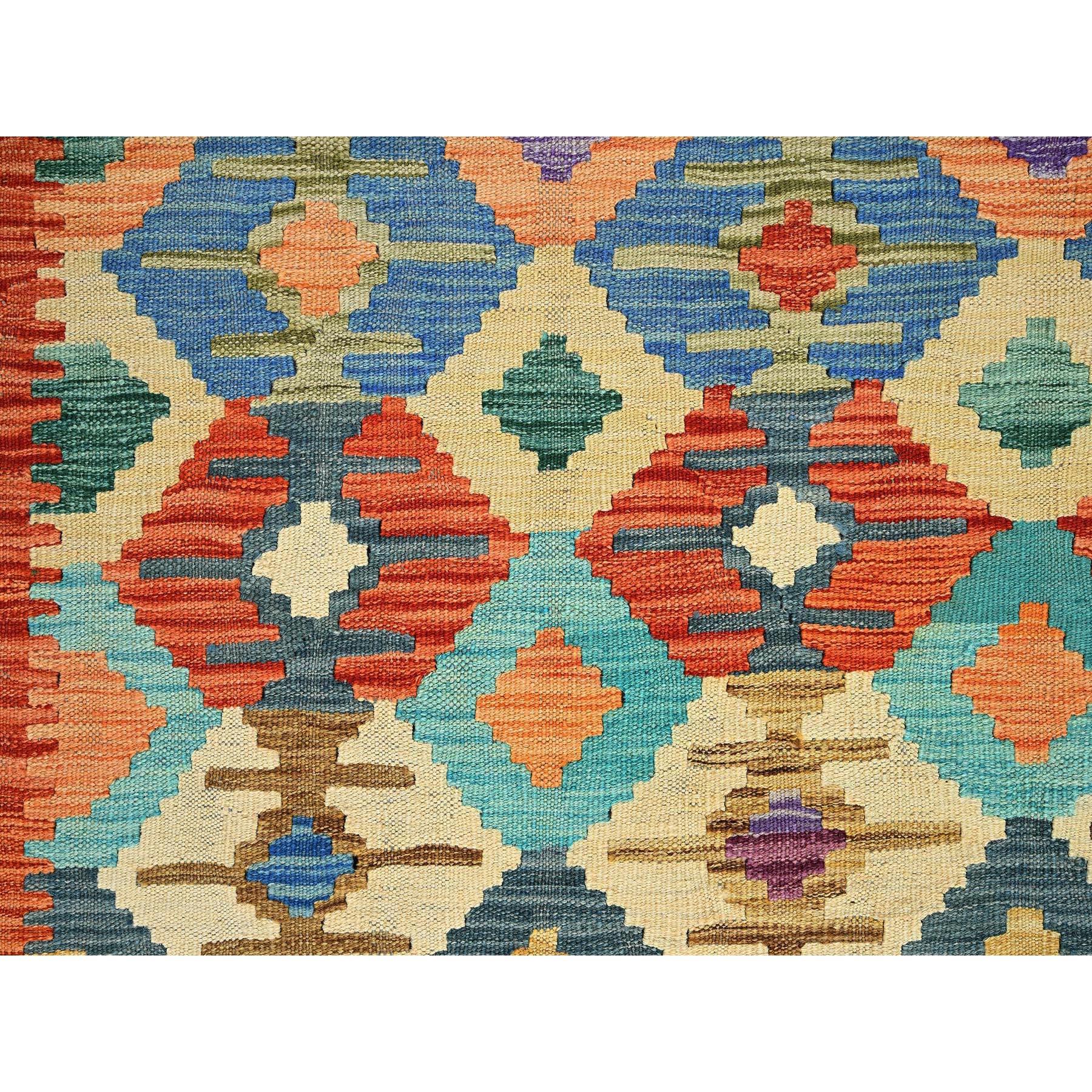 Colorful Afghan Kilim with Geometric Pattern, Vegetable Dyes, Flat Weave, Pure Wool, Hand Woven, Reversible, Oriental Rug
Primary materials: Wool
Latex: No Pile 
height: 0.25 Inches
Style: Traditional
Primary color: Multi
Secondary colors: Ivory,