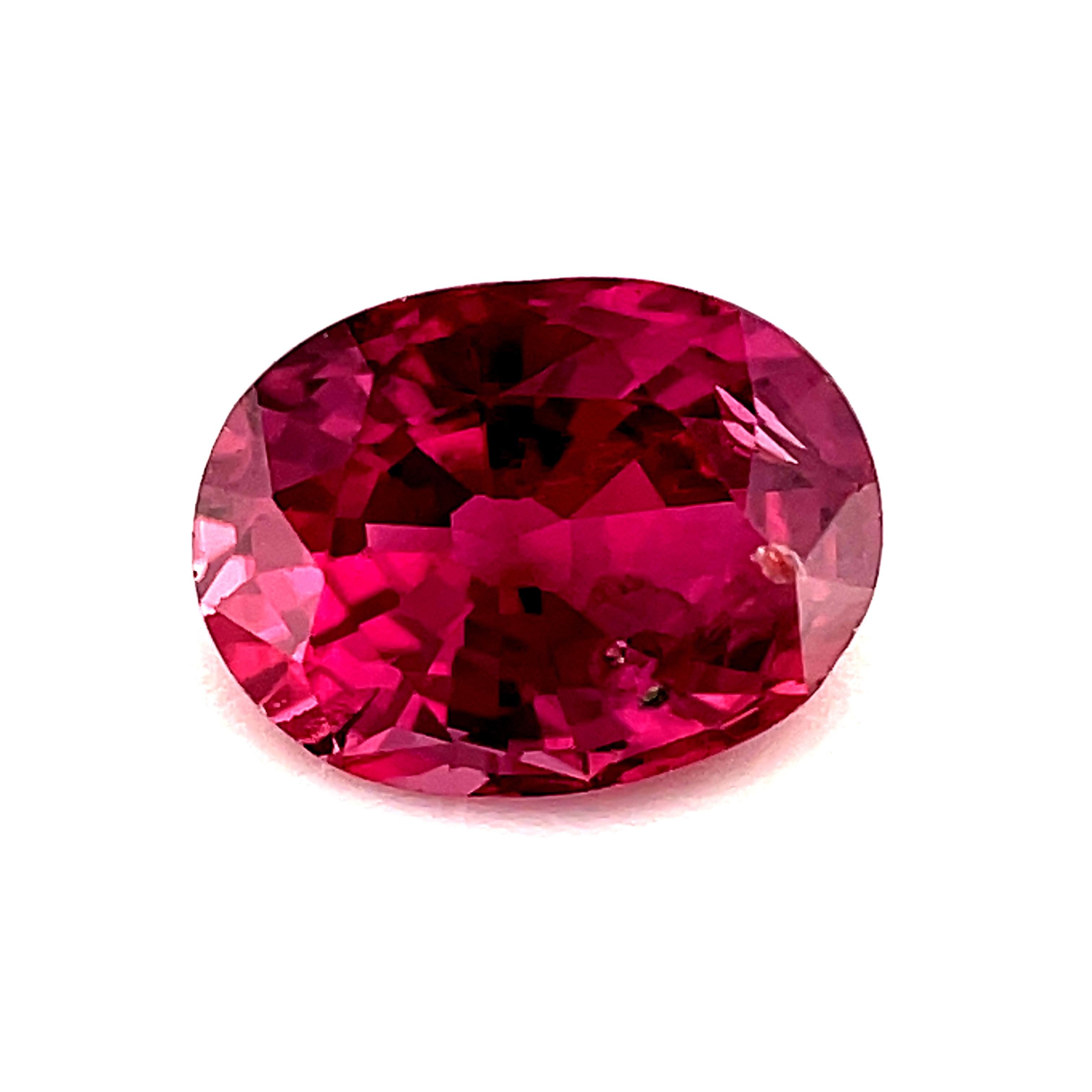 If you are looking for a bright pinkish fancy sapphire with sparkling raspberry highlights, this is your gem! Weighing .96 carats, it is just shy of a full carat, has gorgeous color and is such a brilliant gemstone! This sapphire measures 6.52 x