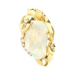 9.6 Carat Solid Australian Carved Opal and Diamond 18 Carat Gold Pendant Brooch