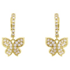Orecchini a farfalla con diamante bianco da .96 CTW in oro giallo 14 carati