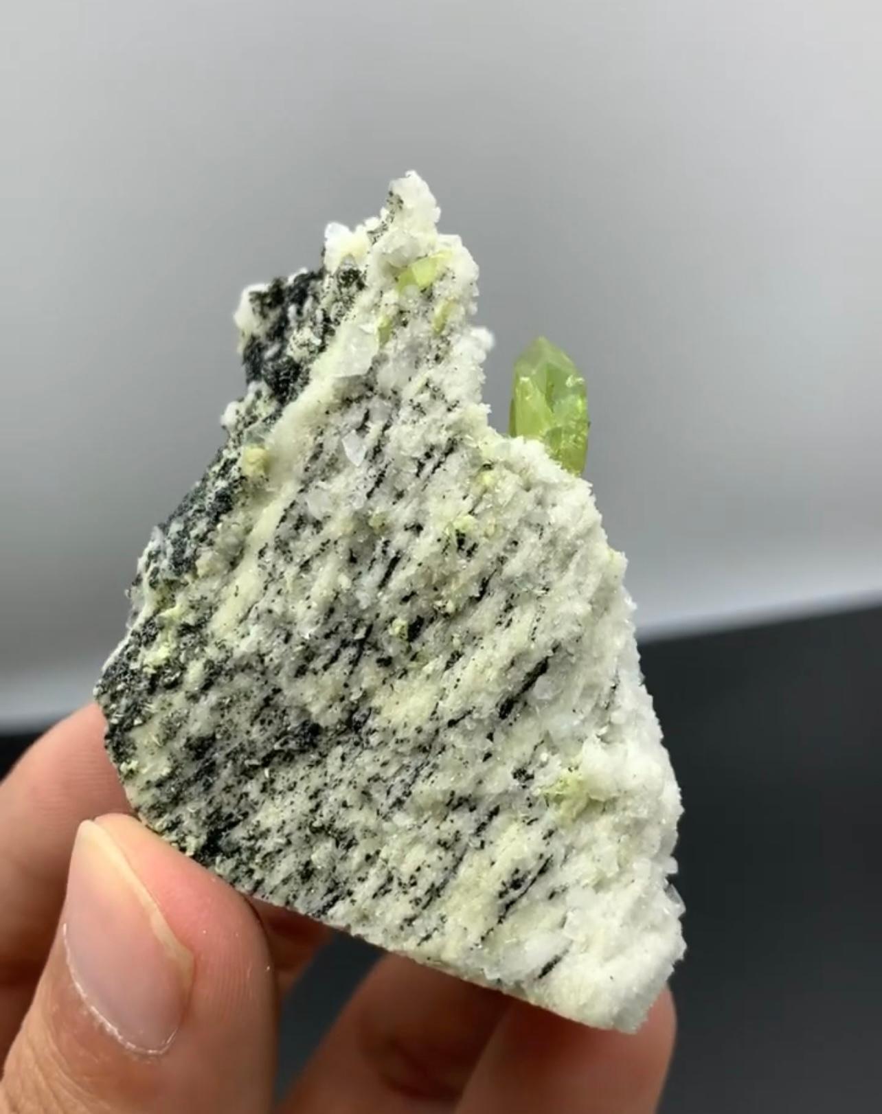 Product Information:

Specimen: Titanite Crystals on Matrix

Weight: 96 grams

Dimension: H: 5.7 x W: 4.7 x D: 4.5 cm

Origin: Zagi Mountains, Hameed Abad, Kafoor Dheri, KPK Province, Pakistan

Treatment: None

Description:

This specimen features