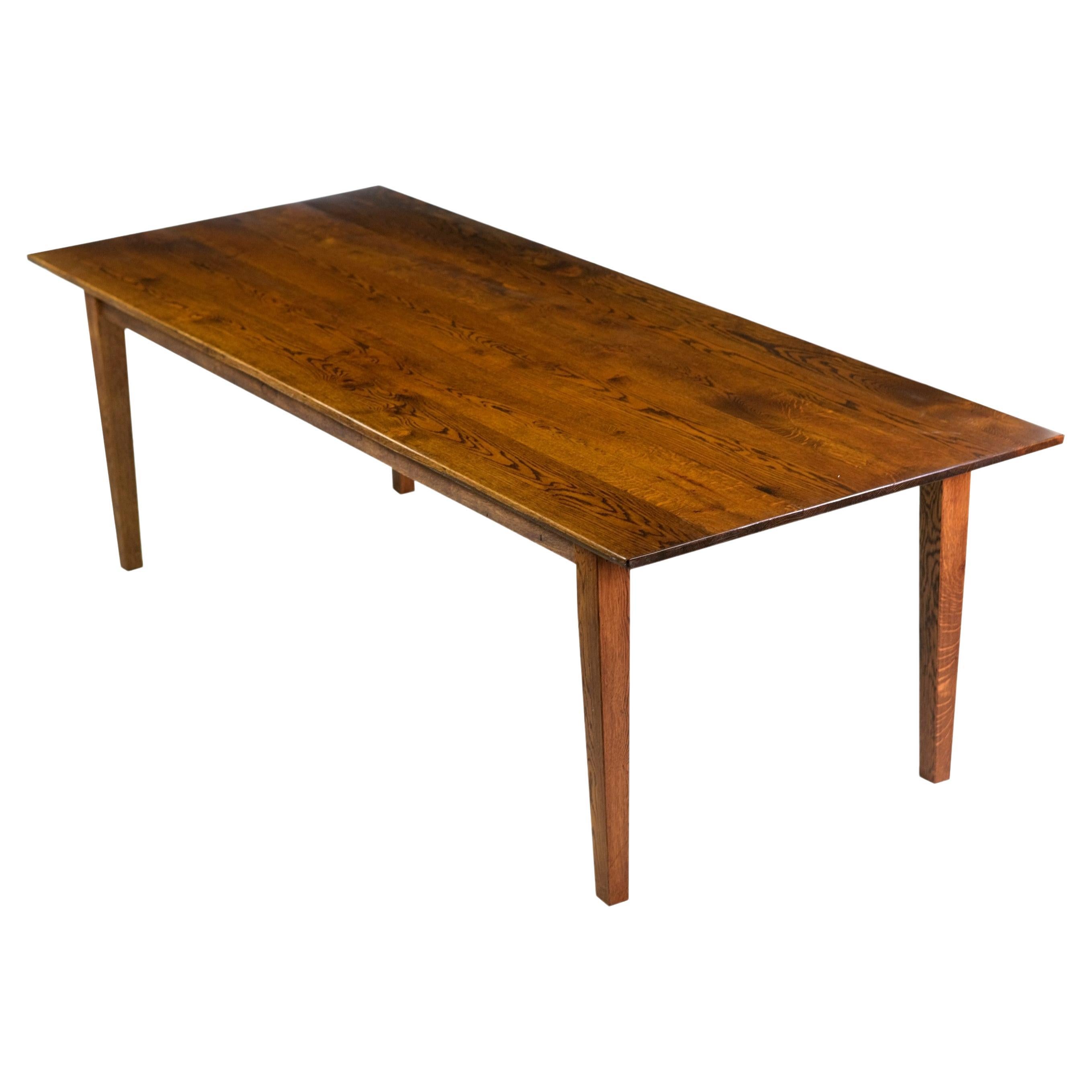 Board Oval Oak Dining Table with Tapered Spindle Legs at 1stDibs