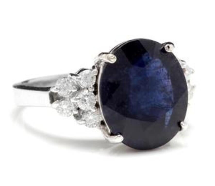 9.60 Carats Exquisite Natural Blue Sapphire and Diamond 14K Solid White Gold Ring

Total Blue Sapphire Weight is: Approx. 9.00 Carats

Sapphire Measures: Approx. 14 x 12.00mm

Sapphire Treatment: Diffusion

Natural Round Diamonds Weight: Approx.