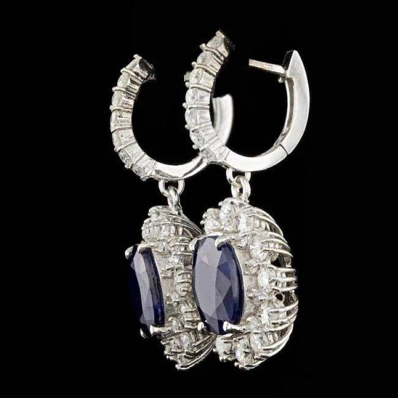 9.60 Carats Natural Sapphire and Diamond 14K Solid White Gold Earrings

Total Natural Oval Shaped Sapphire Weight: Approx. 6.90 Carats

Sapphire Treatment: Diffusion

Sapphire Measure: Approx. 10 x 8 mm

Total Natural Round Diamonds Weight: Approx.