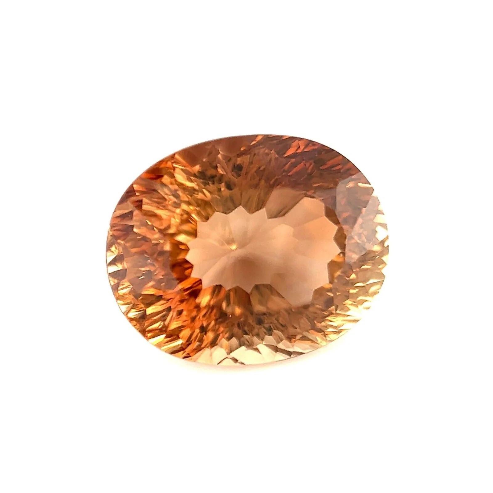 9.60ct Natürlicher Orange Champagner Topas Fancy Oval Konkav Schliff 13,7x11mm Edelstein VVS

Natürlicher Champagne Orange Topas Edelstein. 
9.60 Karat Topas mit schöner, leuchtend orangefarbener 