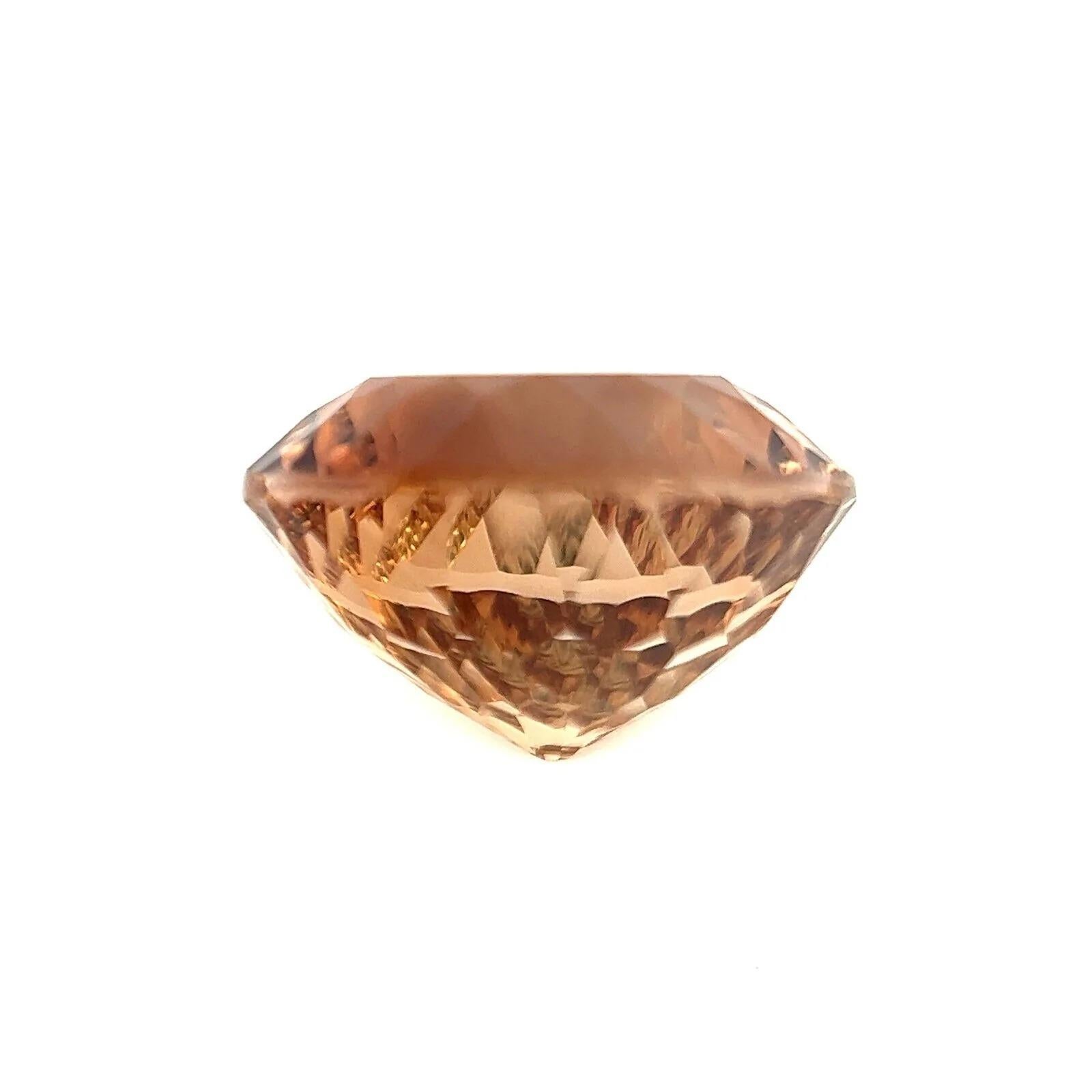 9,60 Karat natürlicher orangefarbener Champagner Topas Fancy Oval Concave Cut Edelstein VVS (Ovalschliff)