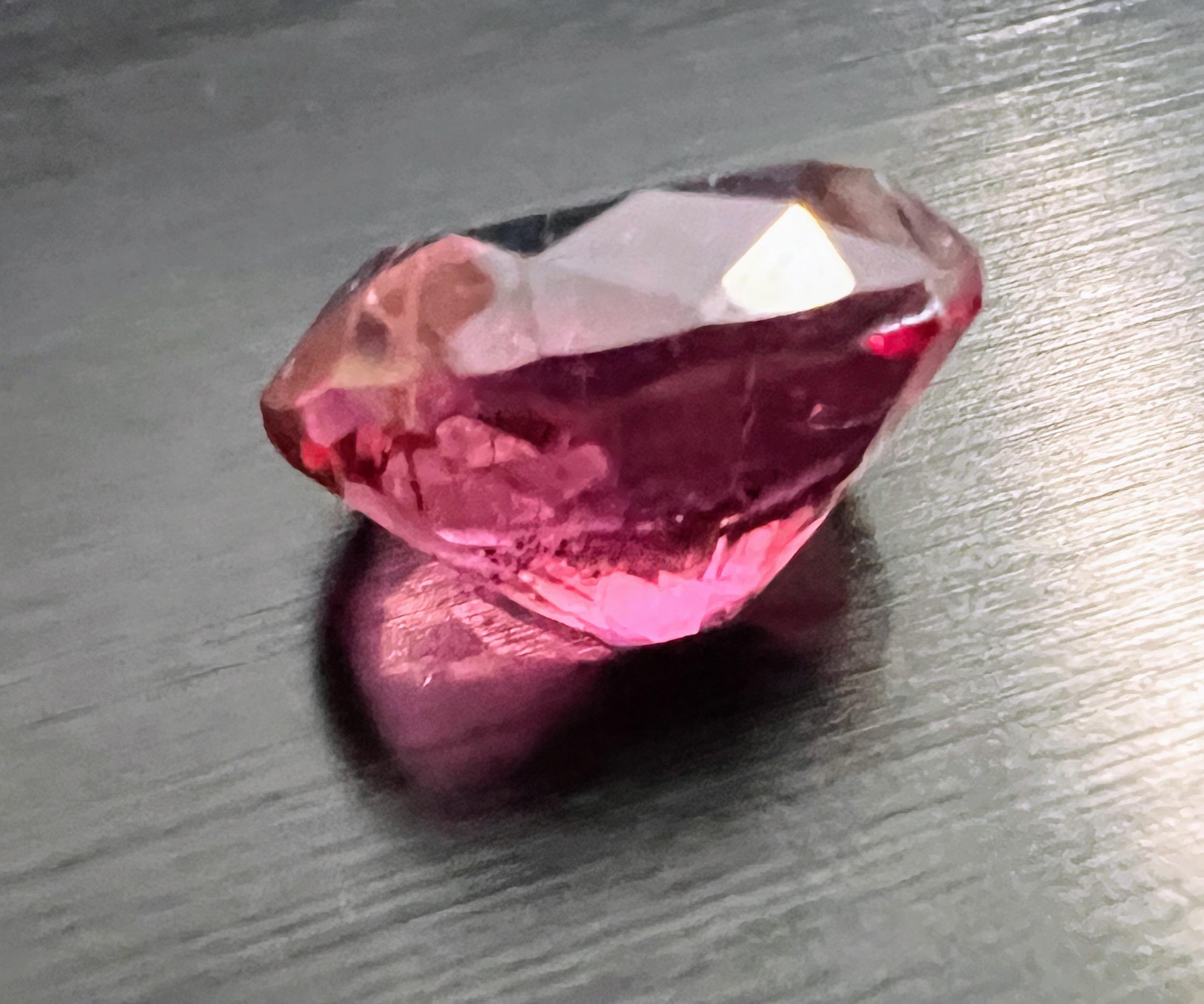 Women's or Men's 9.60ct Oval Dramatic Pink Rubellite Tourmaline Loose Gemstone For Sale