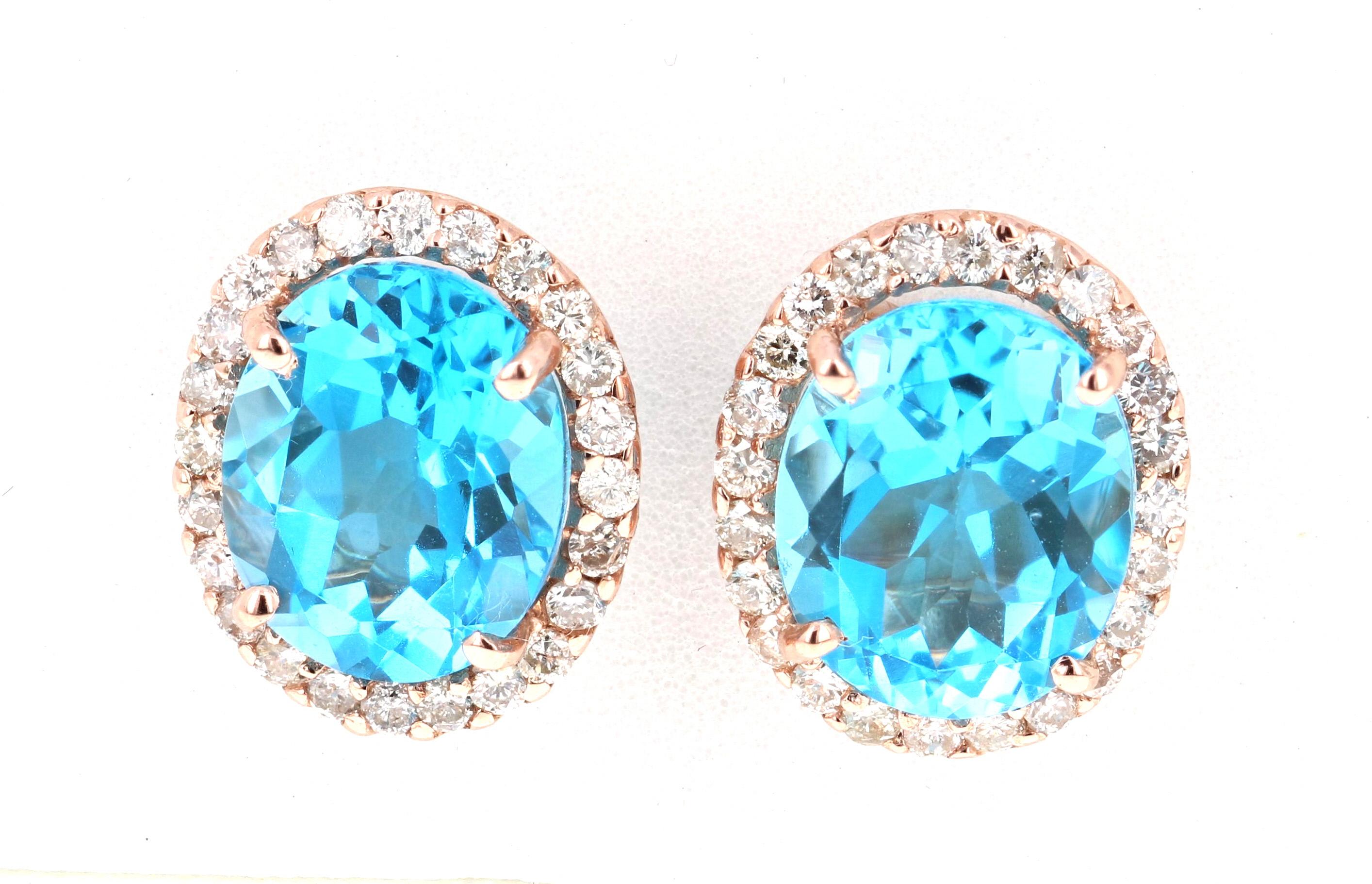 Super cute and classic earring studs made with pretty hues of Blue Topaz and diamonds.   
9.61 Carat Blue Topaz and Diamond 14 Karat Rose Gold Stud Earrings!

There are 2 Oval Cut Blue Topaz in the Earrings that weigh 8.81 Carats and they are