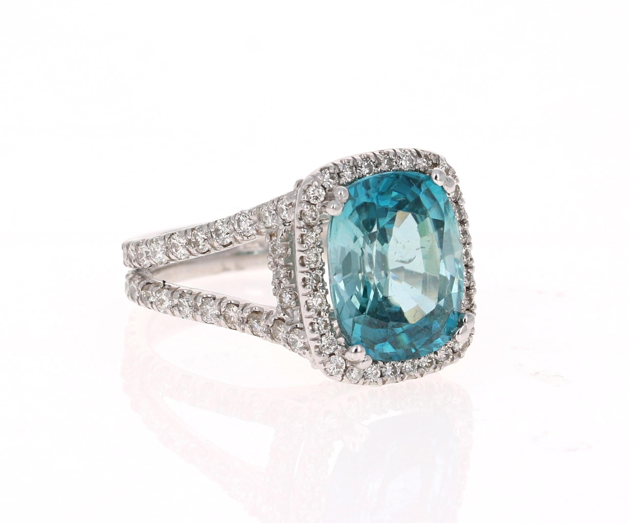 A beautiful Blue Zircon and Diamond ring that can be a nice Engagement ring or a gorgeous Cocktail Ring!
Blue Zircon is a natural stone mined mainly in Sri Lanka, Myanmar, and Australia.  

This ring has a large & beautiful Oval Cut Blue Zircon that