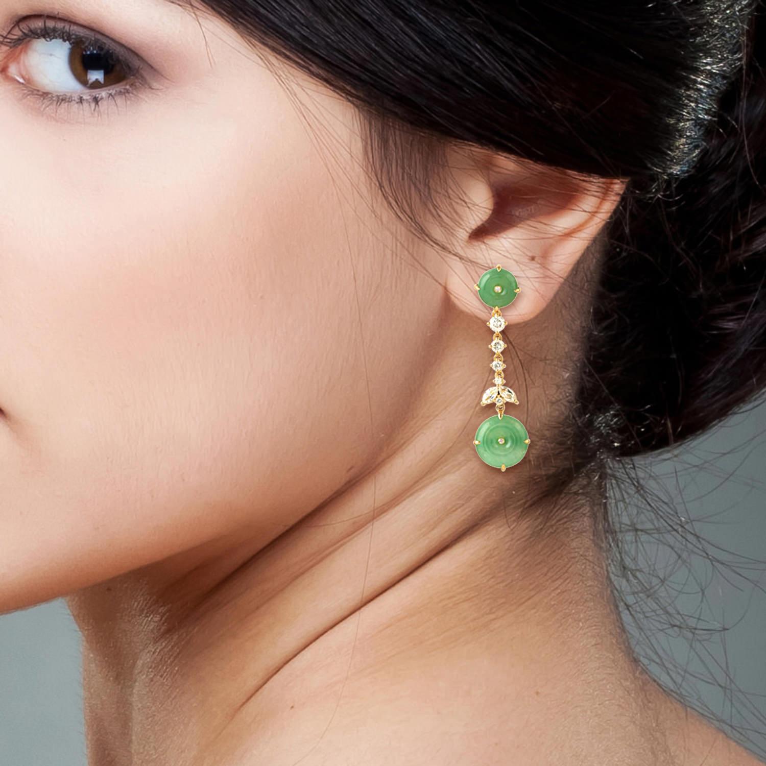 Handcrafted from 14-karat yellow gold, these stunning earrings are set with 9.64 carats Jade, .46 carats sapphire and .58 carats of sparkling diamonds.

FOLLOW  MEGHNA JEWELS storefront to view the latest collection & exclusive pieces.  Meghna