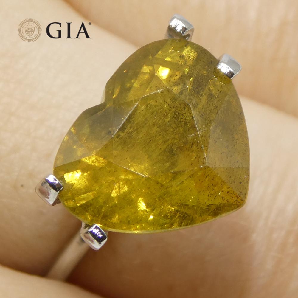 This is a stunning GIA Certified Sapphire 


The GIA report reads as follows:

GIA Report Number: 5231524184
Shape: Heart
Cutting Style: 
Cutting Style: Crown: Brilliant Cut
Cutting Style: Pavilion: Step Cut
Transparency: Semi-Transparent
Colour:
