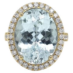 Anillo con turmalina Paraíba de color azul verdoso intenso de 9,64 ct, en oro de 18 quilates, con certificado GIA
