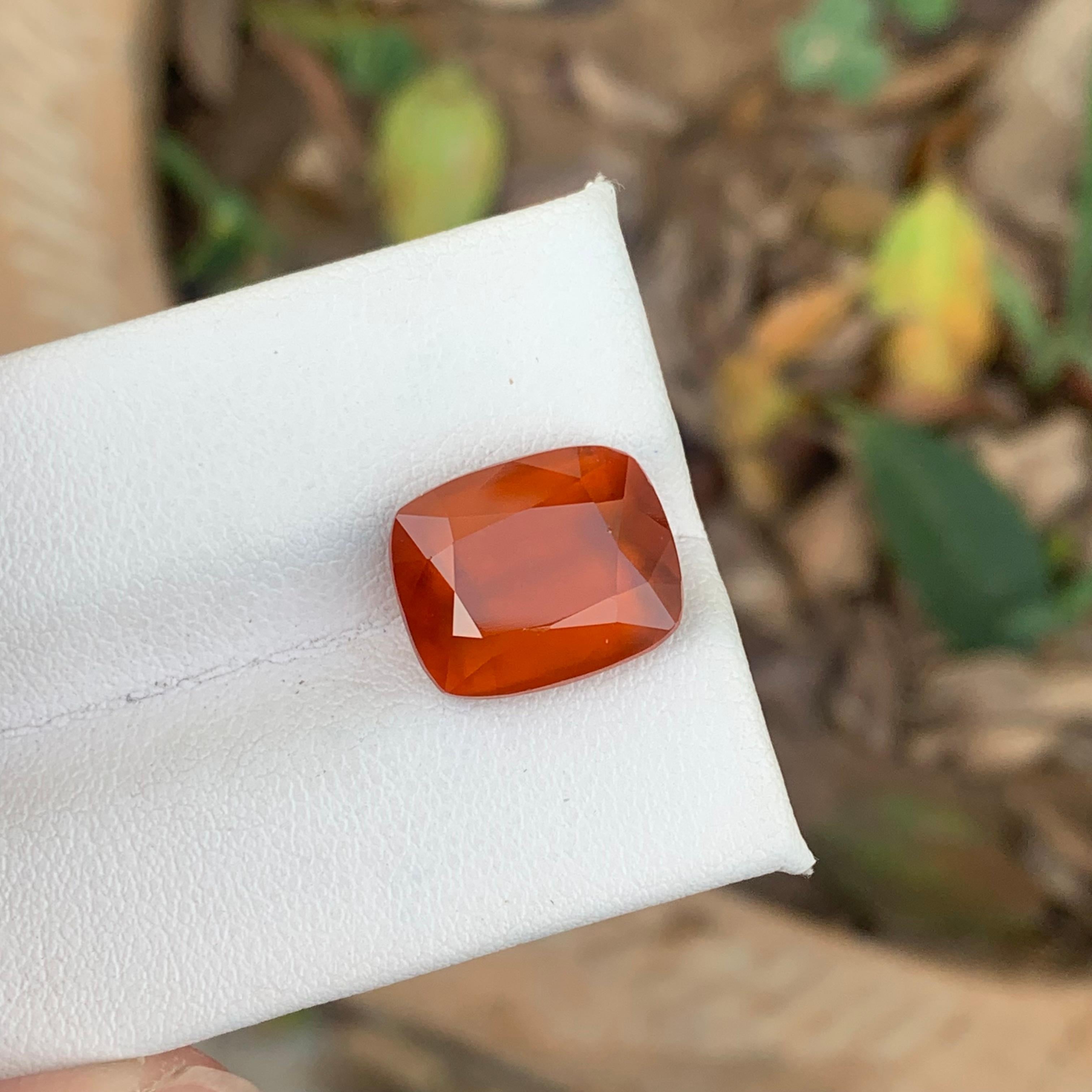 Gemstone Type : Hessonite Garnet
Weight : 9.65 Carats
Dimensions : 13.3x10.9x7.4 Mm
Origin : Africa
Clarity : Smoky 
Shape: Long Cushion
Color: Fanta Orange
Certificate: On Demand
Birthstone: January Month
According to Vedic astrologists, wearing a