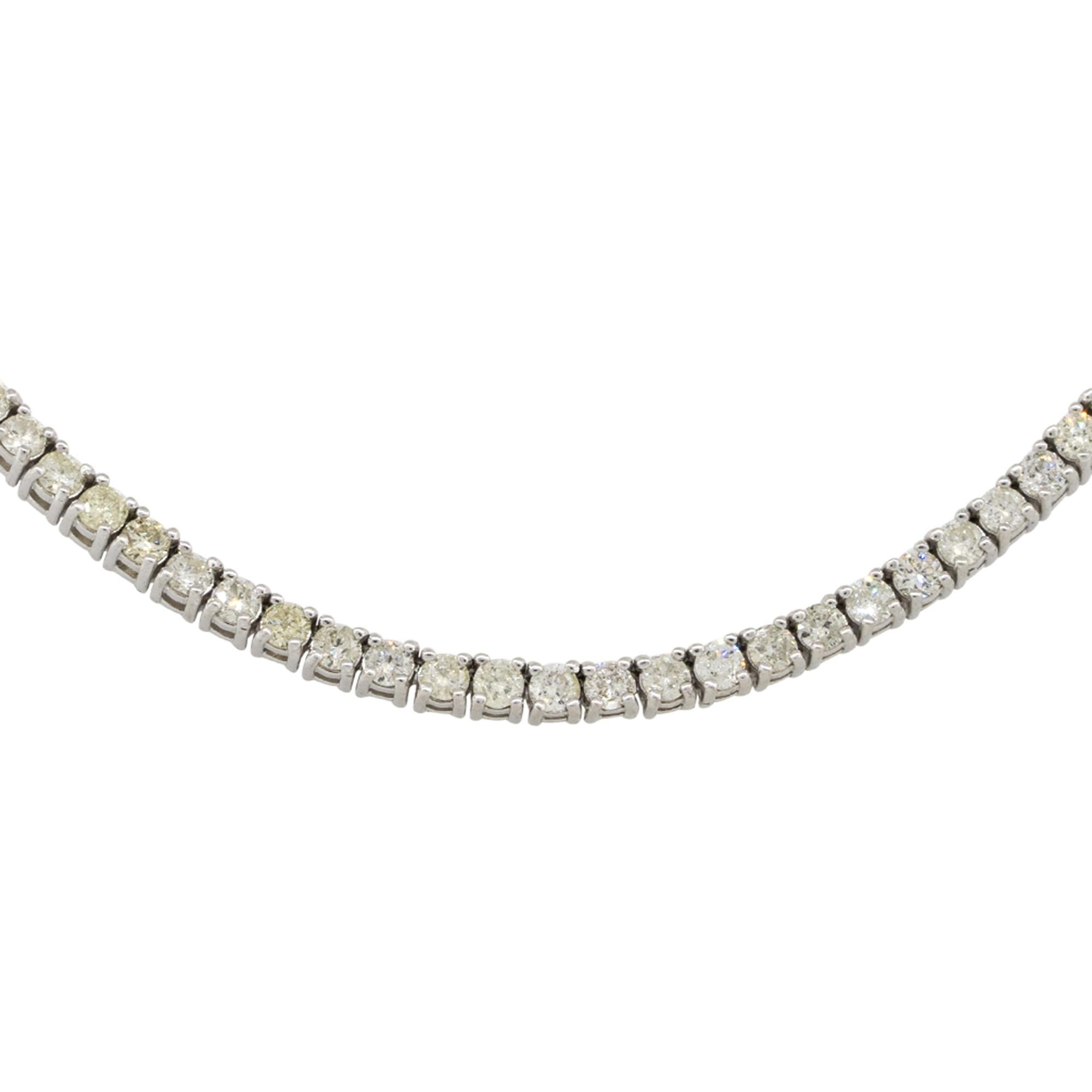 Material: 14k White Gold
Diamond Details: Approx. 9.66ctw of round cut Diamonds. Diamonds are G/H in color and VS in clarity. 220 stones 
Measurements: Necklace measures 22