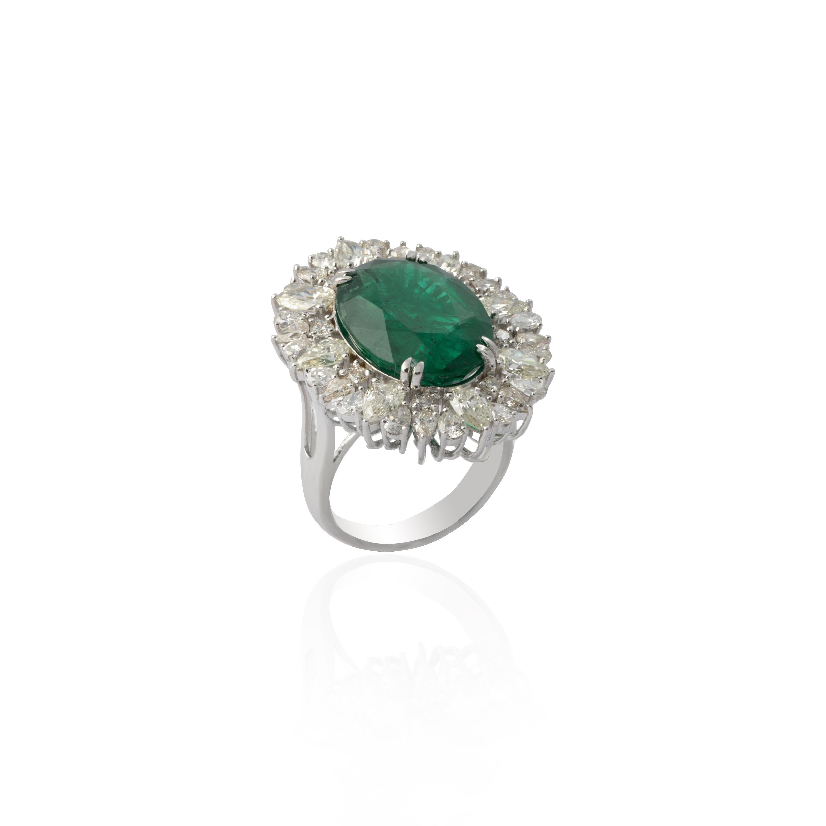 This is a stunning natural Zambian Emerald cocktail ring with big size diamonds in 14k gold

the Emerald is of very good quality and diamonds are big sizes with vsi purity and G colour

Emerald : 9.67 cts
diamonds:  3.37 cts
gold : 6.39 gms

Its