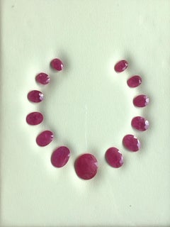 96.75 Carats Ruby Mozambique Oval Faceted Cut stone Layout Heated Natural Gem