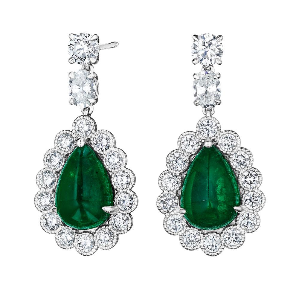 •	18KT White Gold
•	9.67 Carats
•	Sold as a pair (2 earrings in total)

•	Number of Pear Shape Emeralds: 2
•	Carat Weight: 6.25ctw
•	Stone Measurements: 12.5 x 8.5mm

•	Number of Oval Diamonds: 2
•	Carat Weight: 0.72ctw

•	Number of Round Diamonds: