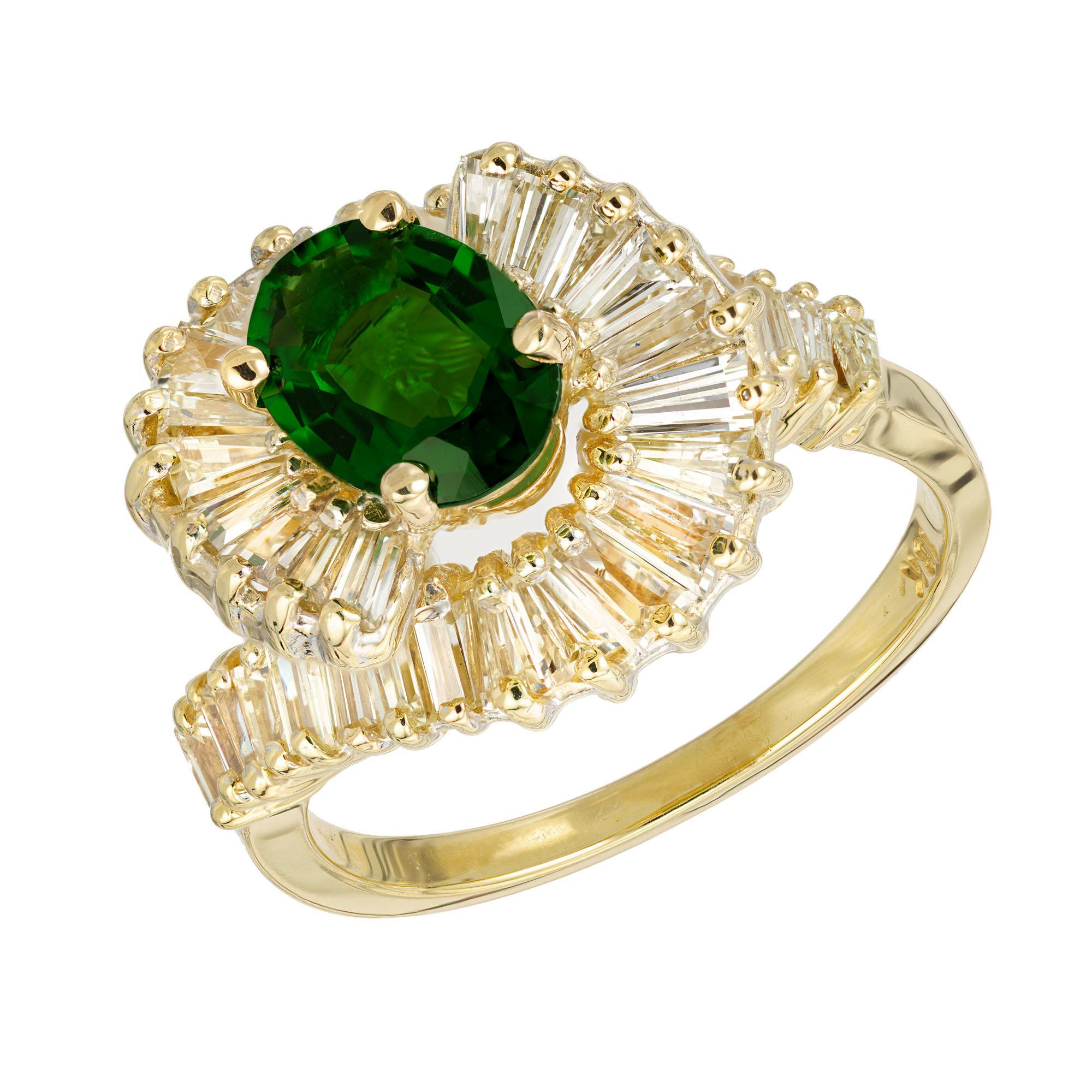 Chrome Tourmaline and diamond swirl design cocktail ring. .97ct. oval tourmaline center stone with a halo of tapered baguette cut diamonds in a 18k yellow gold setting. Circa 1960's.  

1 oval green tourmaline, VS approx. .97cts
38 tapered baguette