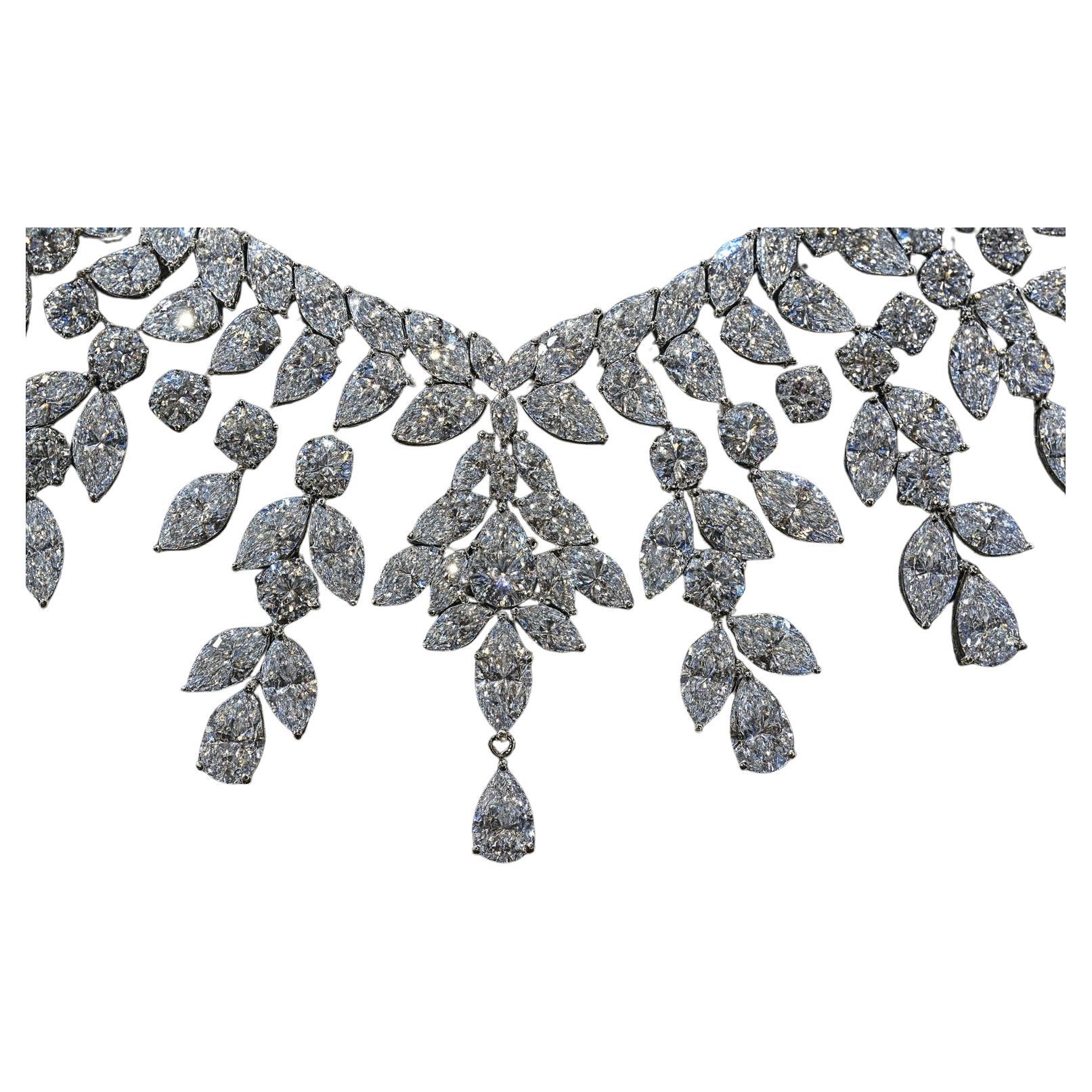 Multi-Shape Diamond Graduated Cluster Collar Necklace

This museum-worthy collar necklace is a breathtaking creation in 100% natural 18k white gold, presented in brand new condition. The piece carries an extraordinary total diamond weight of 97.00