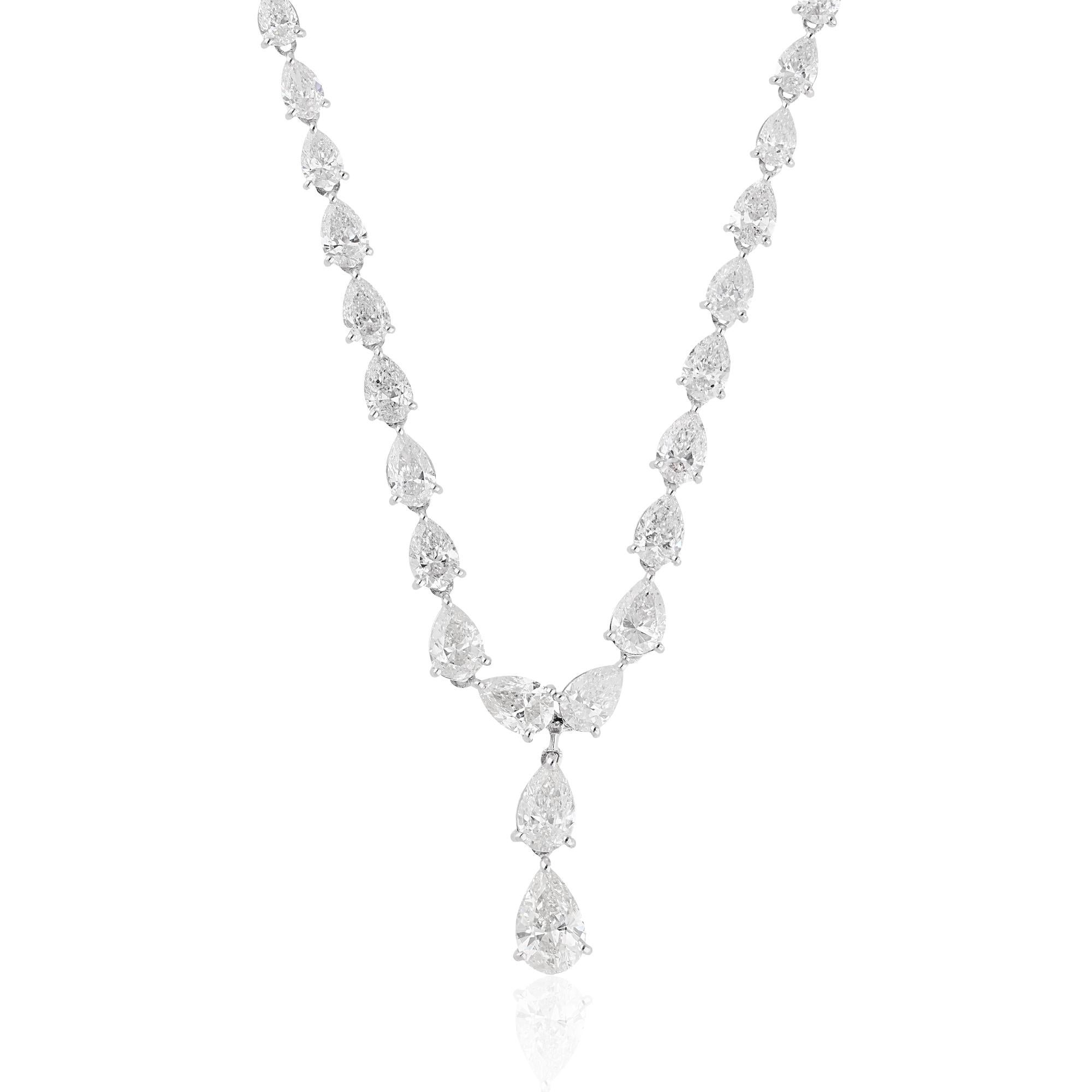 Crafted with meticulous attention to detail, the pear-shaped diamond is suspended from a delicate lariat chain, creating a graceful and feminine silhouette. The lustrous 14 Karat White Gold setting enhances the beauty of the diamond, providing a