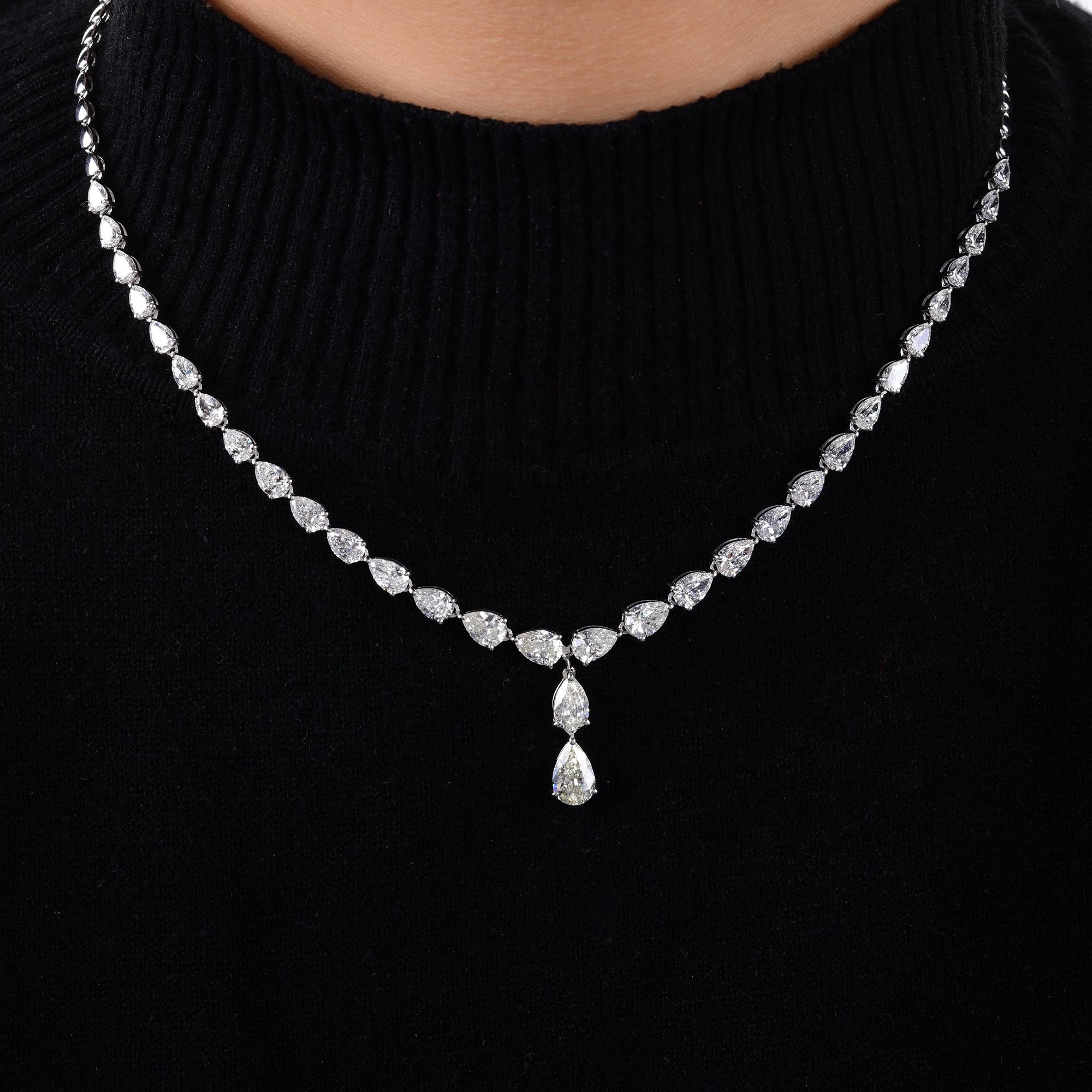 Questa collana a goccia in oro bianco 14 carati con diamanti a pera SI/H da 9,7 carati presenta un diamante a pera su tutta la catena e un pendente a pera che penzola al centro. 
I diamanti sono un simbolo universale di eternità e forza. È una