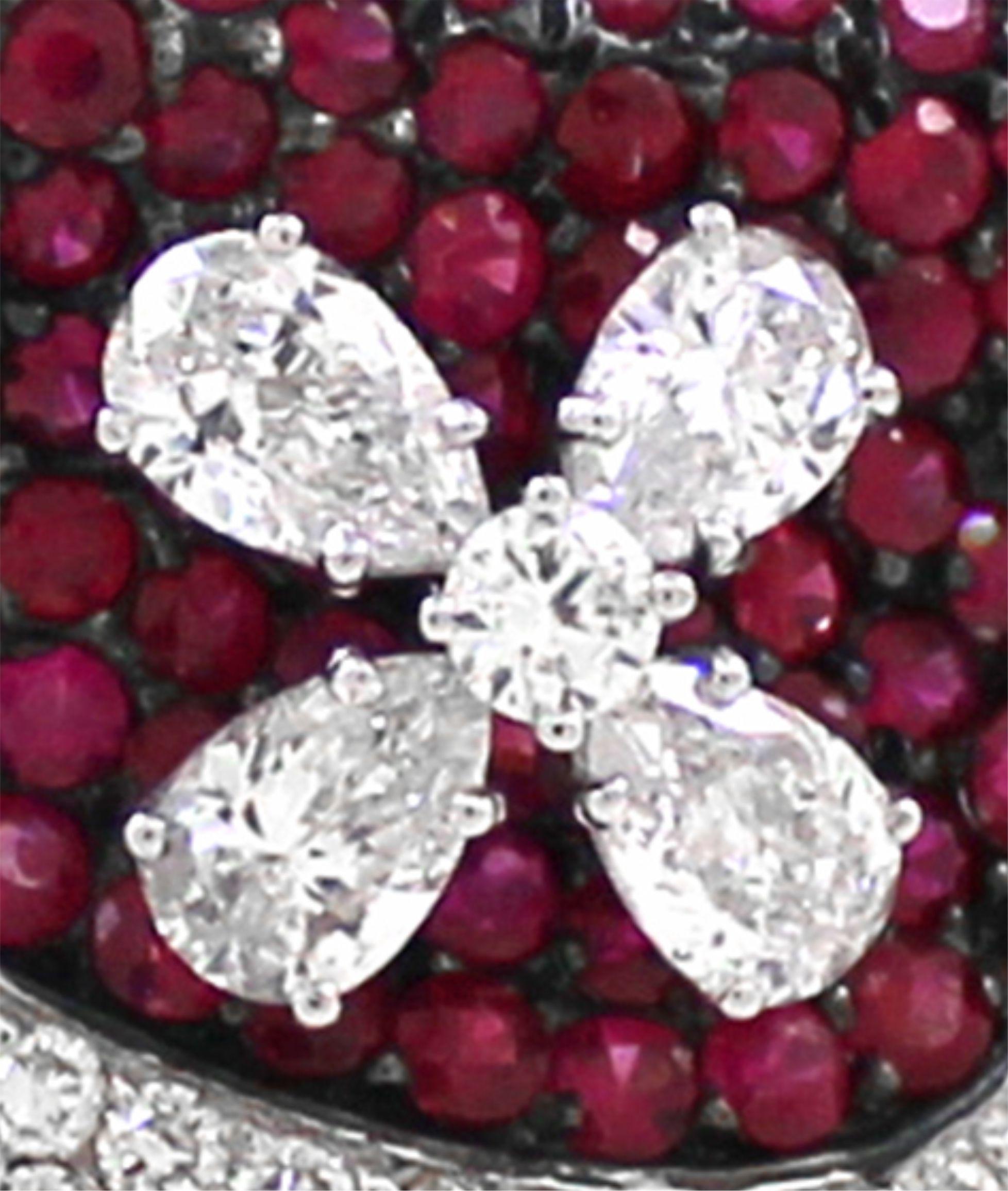 Modern 9.7 cts of White Diamond and 4.17 cts of Ruby Bangle For Sale