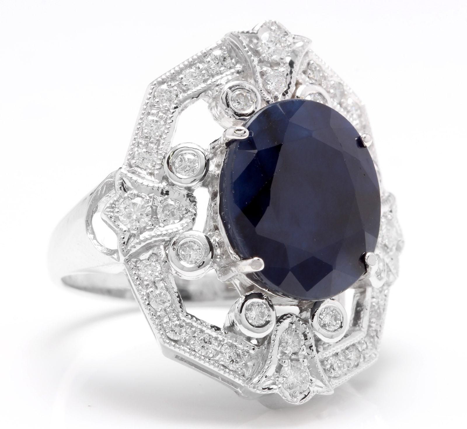 9.70 Carats Exquisite Natural Blue Sapphire and Diamond 14K Solid White Gold Ring

Total Blue Sapphire Weight is: 8.50 Carats

Sapphire Measures: Approx. 14 x 12mm

Natural Round Diamonds Weight: 1.20 Carats (color G-H / Clarity SI1-SI2)

Ring size: