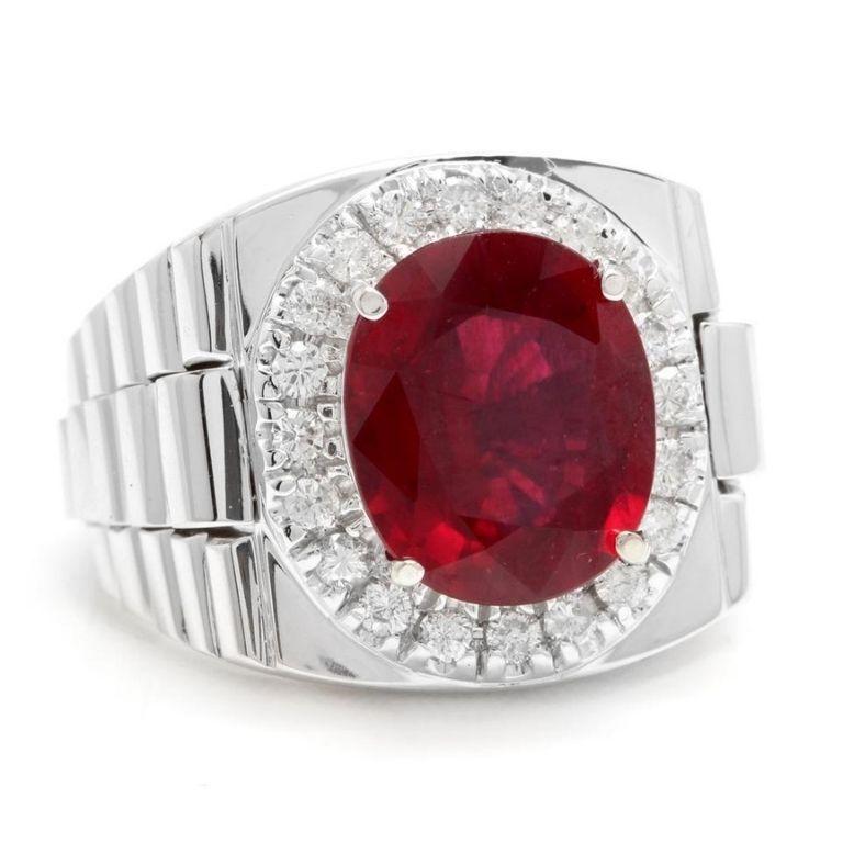 9.70 Carats Natural Diamond & Ruby 14K Solid White Gold Men's Ring

Amazing looking piece!

Total Natural Round Cut Diamonds Weight: Approx. 0.70 Carats (color G-H / Clarity SI1-SI2)

Total Ruby Weight is: Approx. 9.00ct

Ruby Measures: Approx.