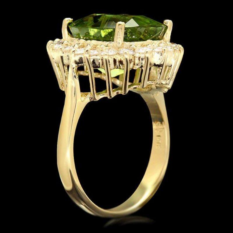 9.70 Carats Natural Peridot and Diamond 14K Solid Yellow Gold Ring

Total Natural Oval Peridot Weight is: Approx. 8.80 Carats 

Peridot Measures: Approx. 13.00 x 11.00mm
 
Natural Round Diamonds Weight: Approx. 0.90 Carats (color G-H / Clarity