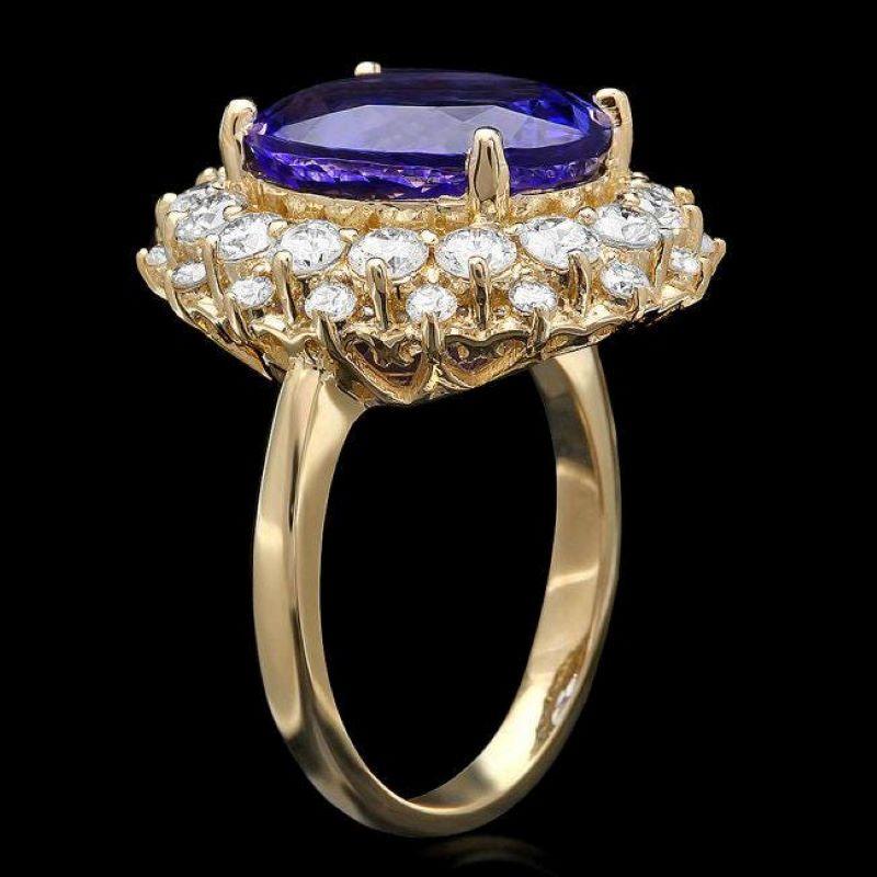 9.70 Carats Natural Tanzanite and Diamond 14K Solid Yellow Gold Ring

Total Natural Tanzanite Weight is: Approx. 7.90 Carats 

Tanzanite Measures: Approx. 14.00 x 11.00mm
 
Natural Round Diamonds Weight: Approx. 1.80 Carats (color G-H / Clarity