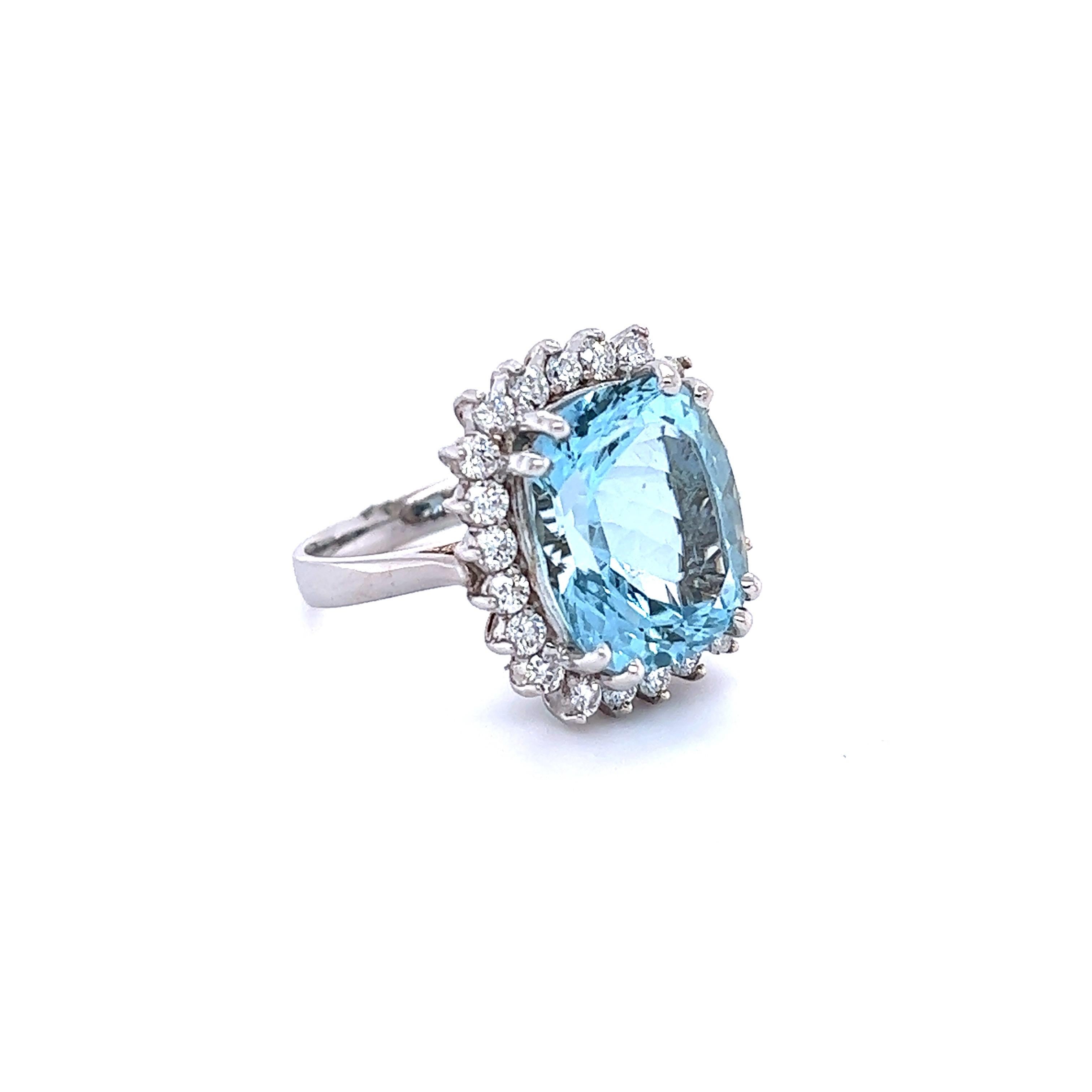 This ring has a 8.75 Carat Cushion-Emerald Cut Aquamarine set in the center of the ring and is surrounded by 22 Round Cut Diamonds that weigh 0.96 carat (Clarity: VS2, Color: F). The total carat weight of this ring is 9.71 carats. 
The Aquamarine