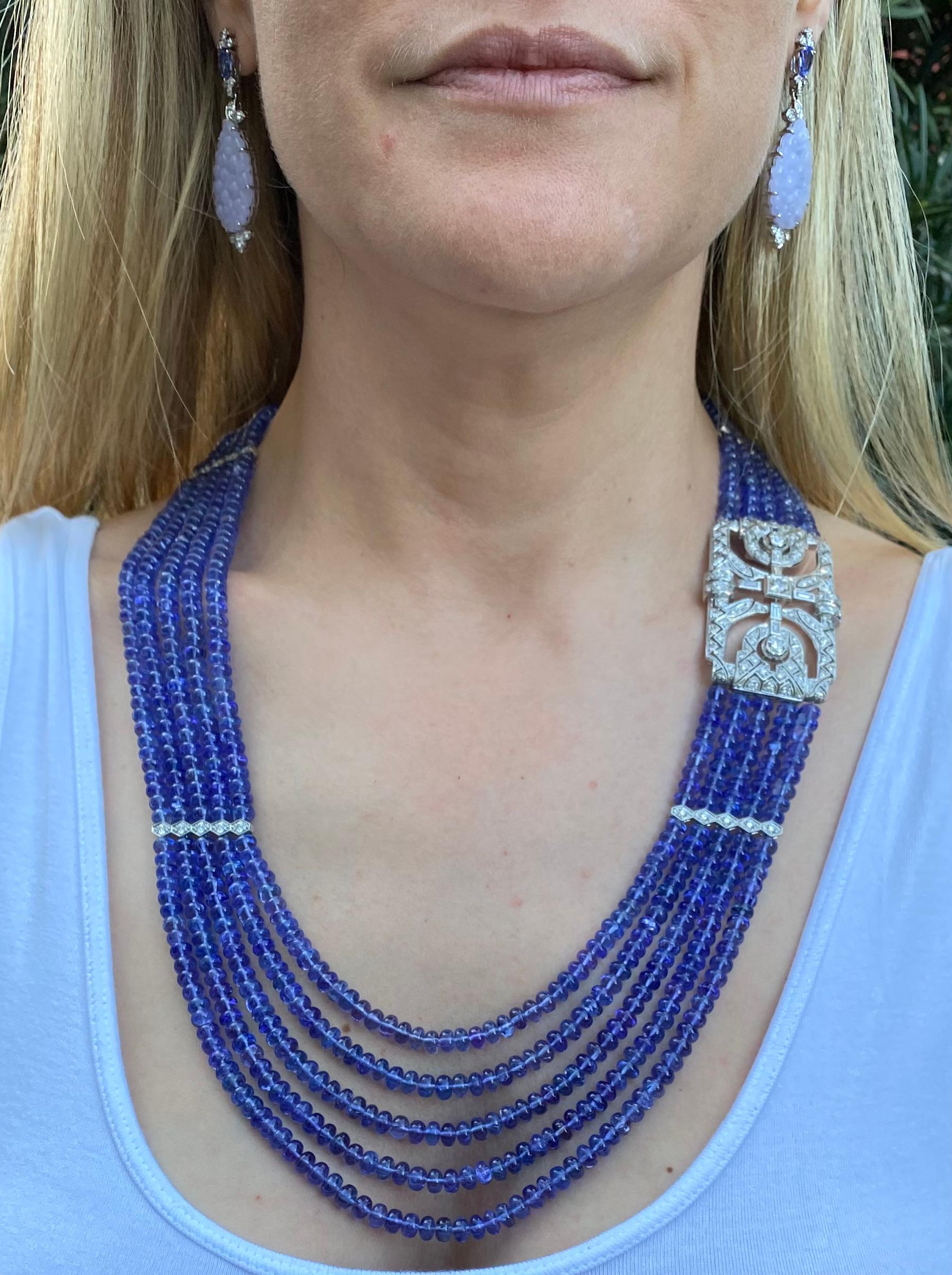 Where to begin on this striking and completely one of a kind necklace?  Inspiration came with the discovery of an antique 7 Carat Diamond and Platinum pin imagined as a striking clasp. Shortly thereafter, Kiersten Elizabeth was entranced by the
