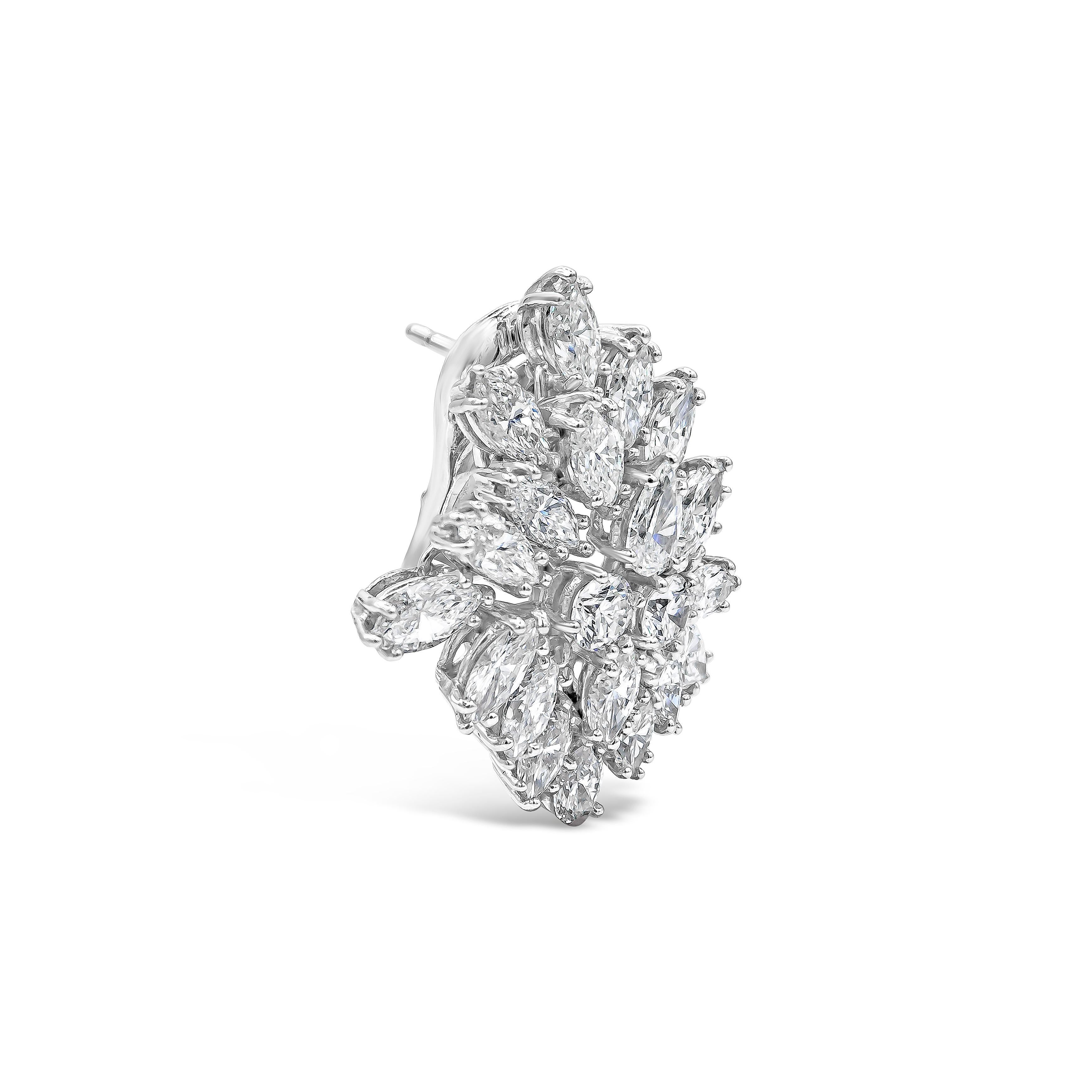 An elegant and intricate piece of jewelry that showcases round, pear, and marquise cut diamonds set in an intricate starburst design. Diamonds weigh 9.73 carats total. Set in platinum. Omega Clip with post.

Style available in different price