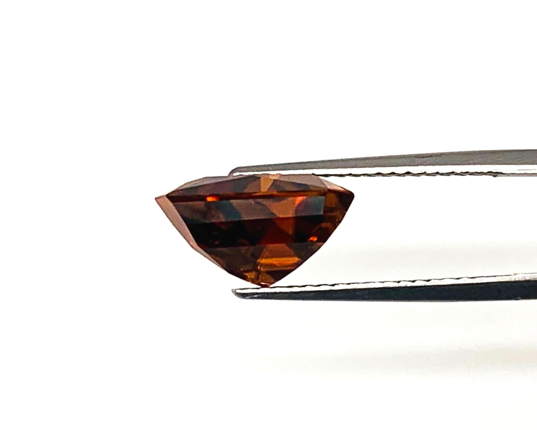 Women's or Men's 9.75 Carat Orange Brown Zircon Triangle, Loose Gemstone For Sale