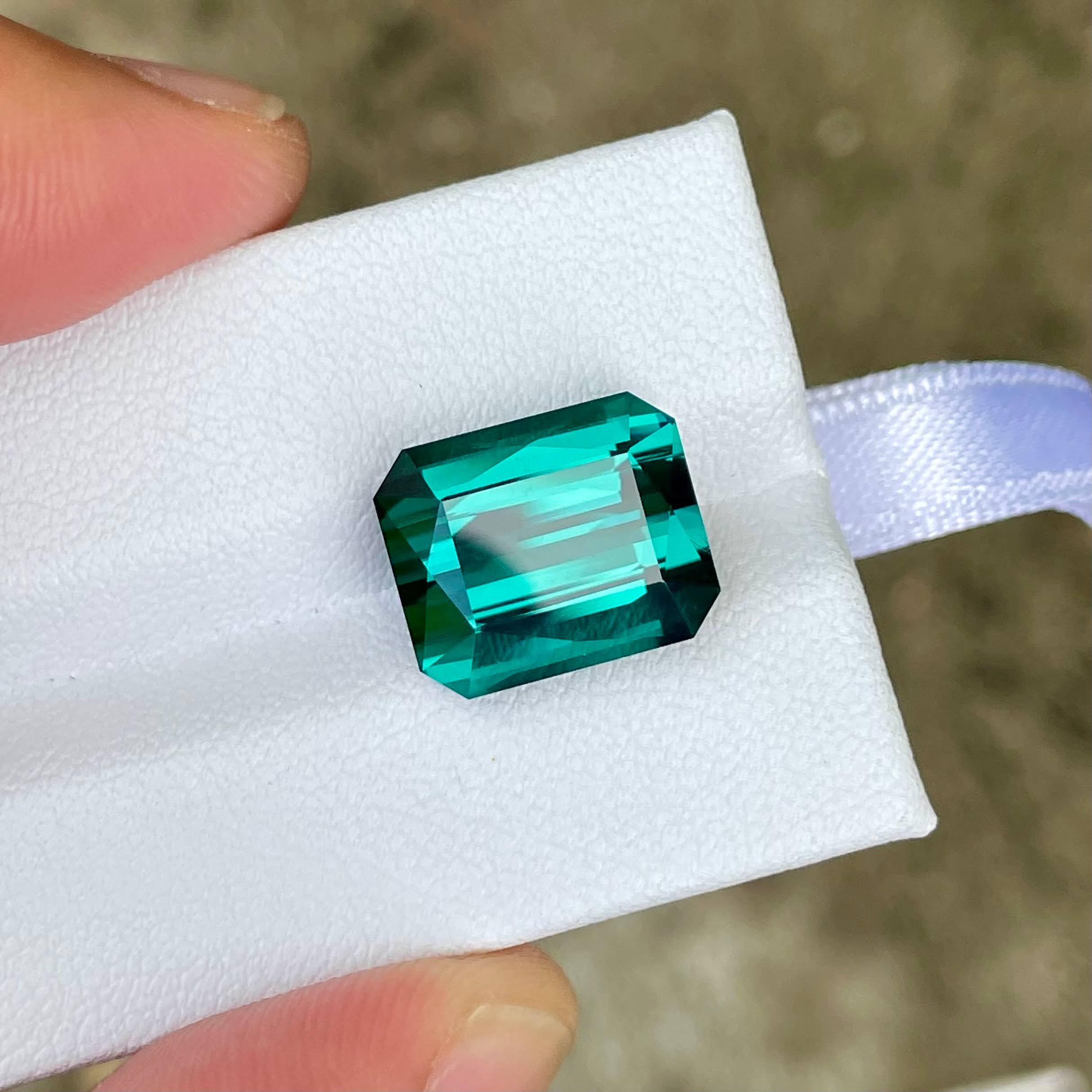 Weight 9.75 carats 
Dimensions 13.4x11.0x7.7 mm
Treatment none 
Origin Afghanistan 
Clarity loupe clean 
Shape octagon 
Cut scissors 



This exquisite 9.75 carat Lagoon Blue Tourmaline gemstone is a stunning example of nature’s beauty. Sourced from