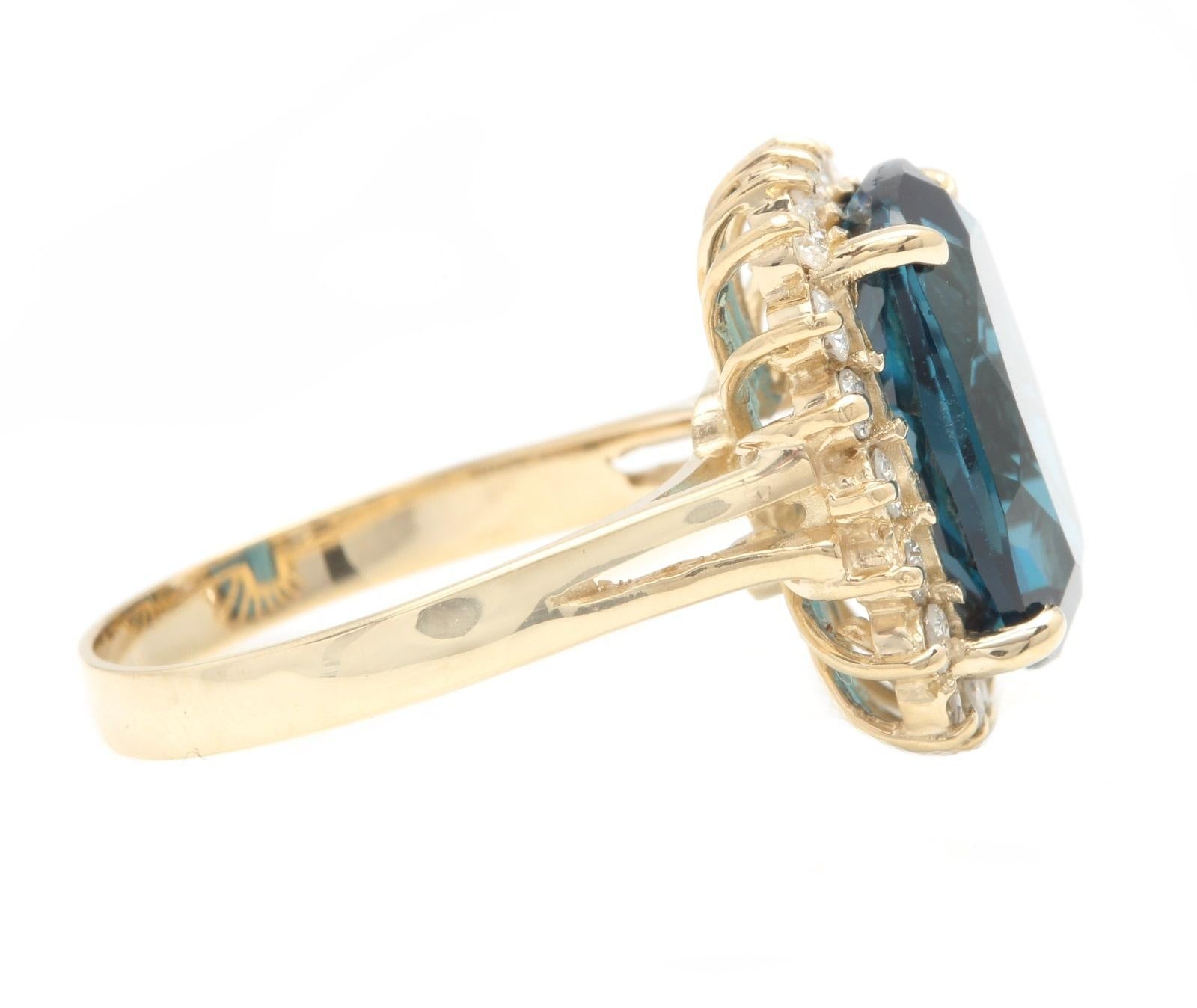 9.75 Carats Natural Impressive London Blue Topaz and Diamond 14K Yellow Gold Ring

Suggested Replacement Value Approx. $6,000.00

Total Natural London Blue Topaz Weight: Approx. 9.00 Carats (Heated, Irradiated)

London Blue Topaz Measures: Approx.