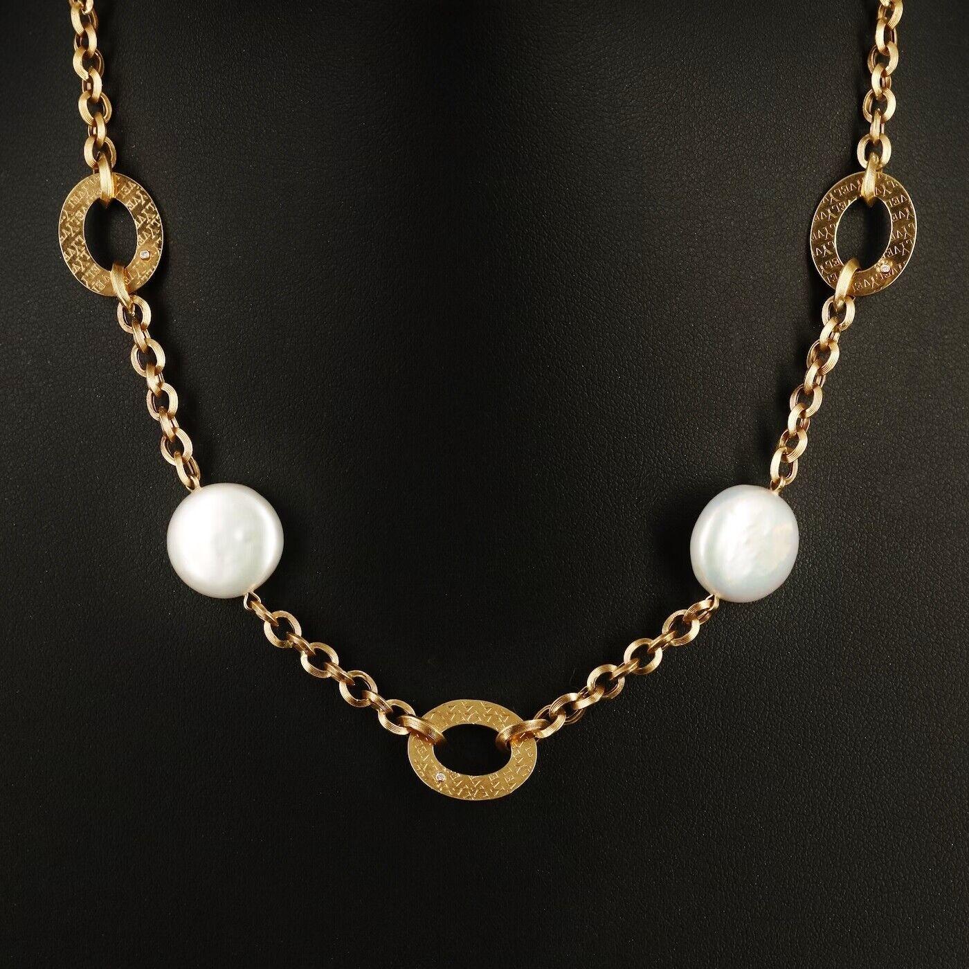 Designer Yvel Necklace (stamped with the designer hallmarks)

BIWA Collection, BIWA Natural Japanese Coin pearls

NEW with tags, Tag Price $9750

18K solid Yellow gold

Very heavy and well made, 16.7 grams in weight 

Top Quality Diamond and Pearls,