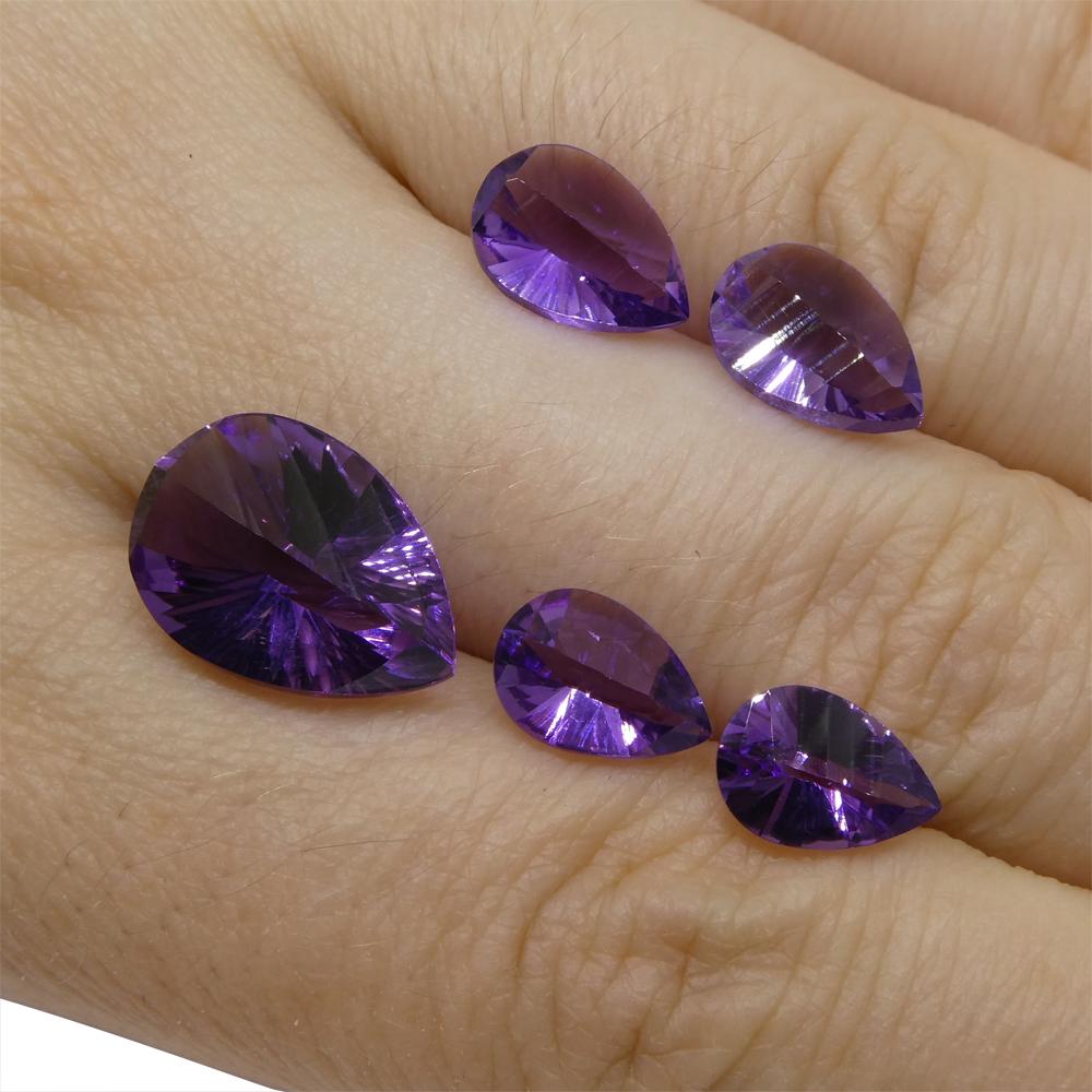 Description:

Gem Type: Amethyst
Number of Stones: 5
Weight: 9.75 cts
Measurements: 1x 14.00x10.00mm, 2x 10.00x7.00mm, 2x 9.00x6.00mm
Shape: Pear
Cutting Style Crown: Modified Brilliant
Cutting Style Pavilion: Mixed Cut
Transparency: