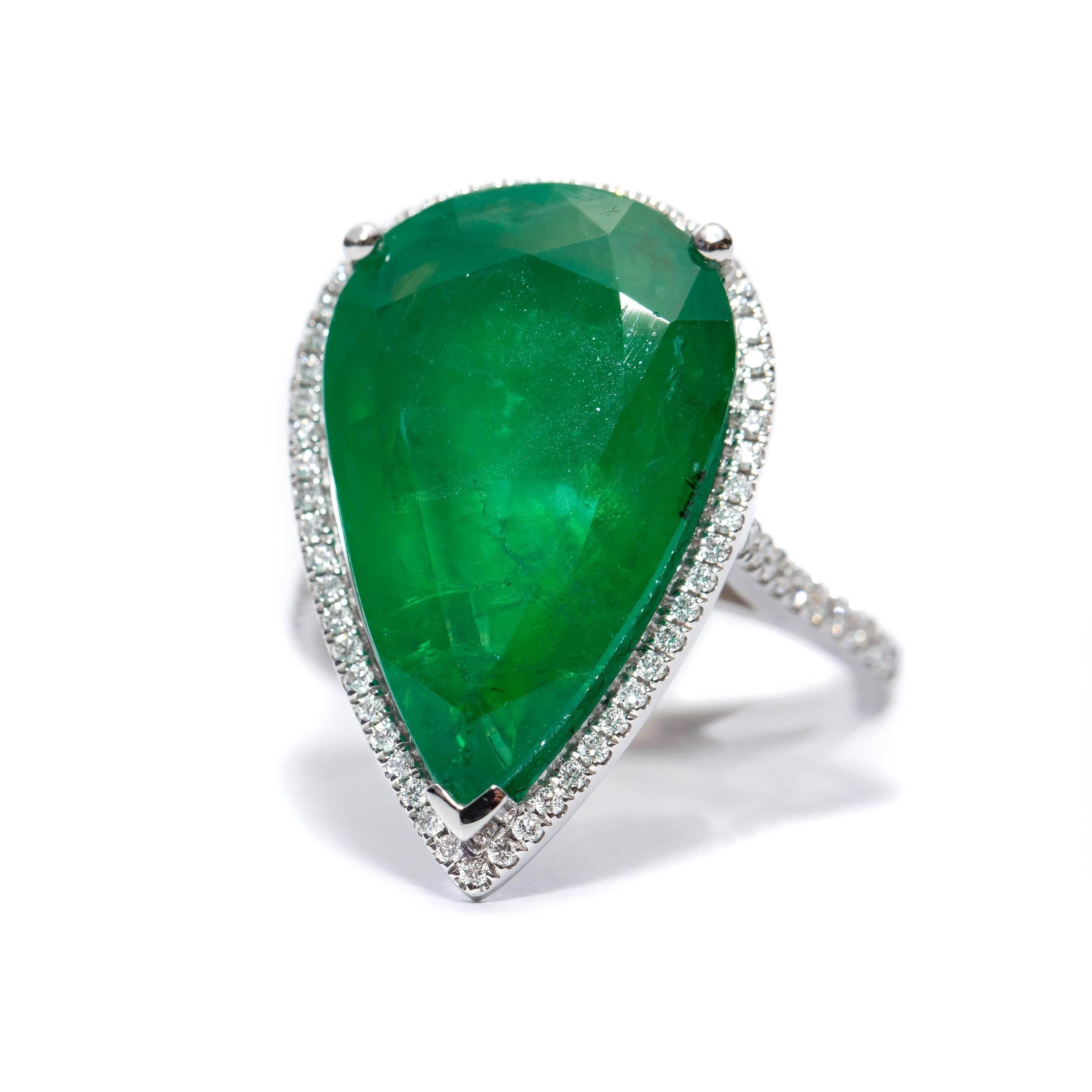 Women's 9.78 Carat Pear Shaped Emerald 0.33 Carat Round Diamond 18 Karat White Gold Ring For Sale