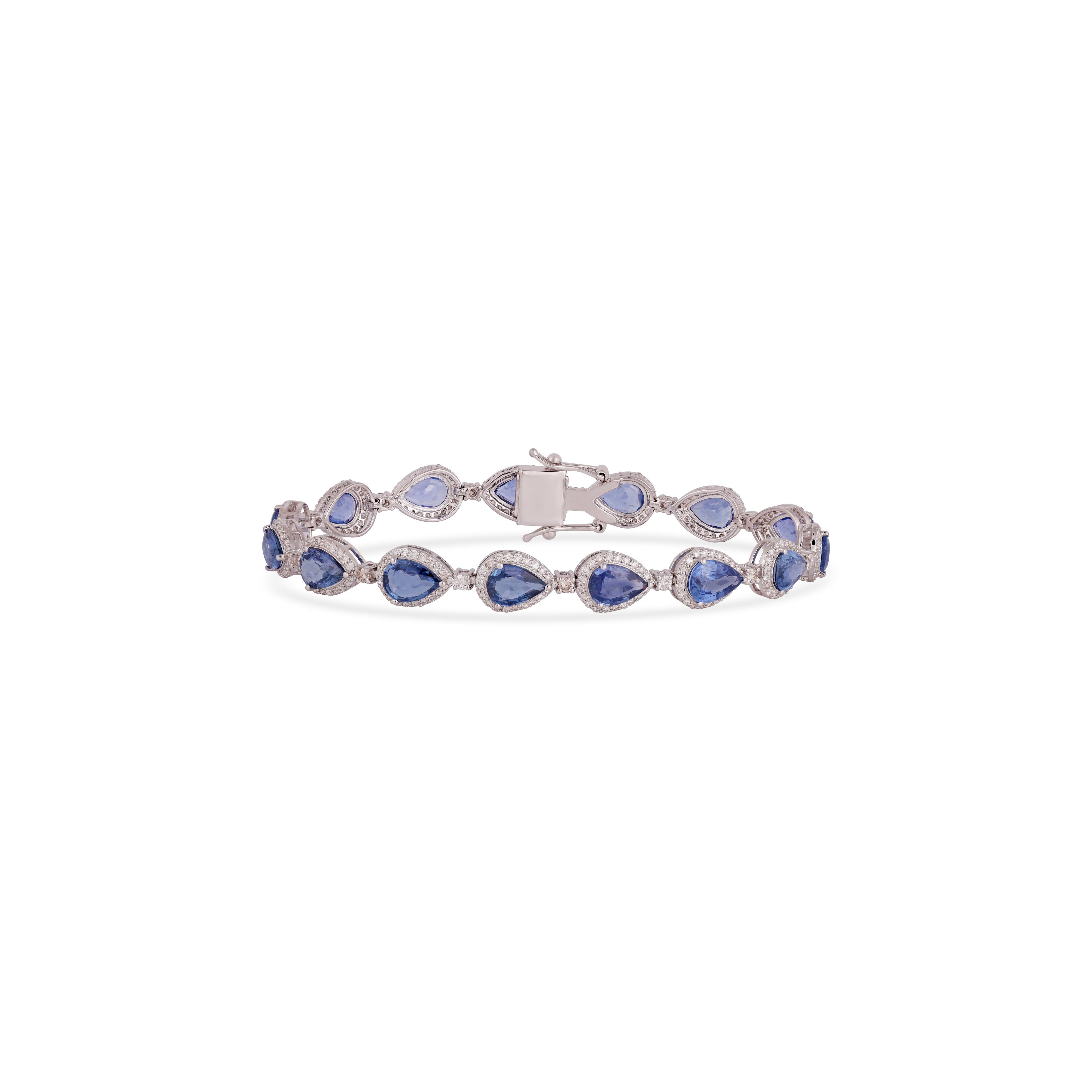 Bracelet saphir et diamant de 9,79 carats en or blanc 18k

Ce magnifique bracelet de tennis en saphir de forme poire est incroyable. Les saphirs solitaires en forme de poire et de taille ovale sont magnifiquement Avec des diamants en grappe rendant