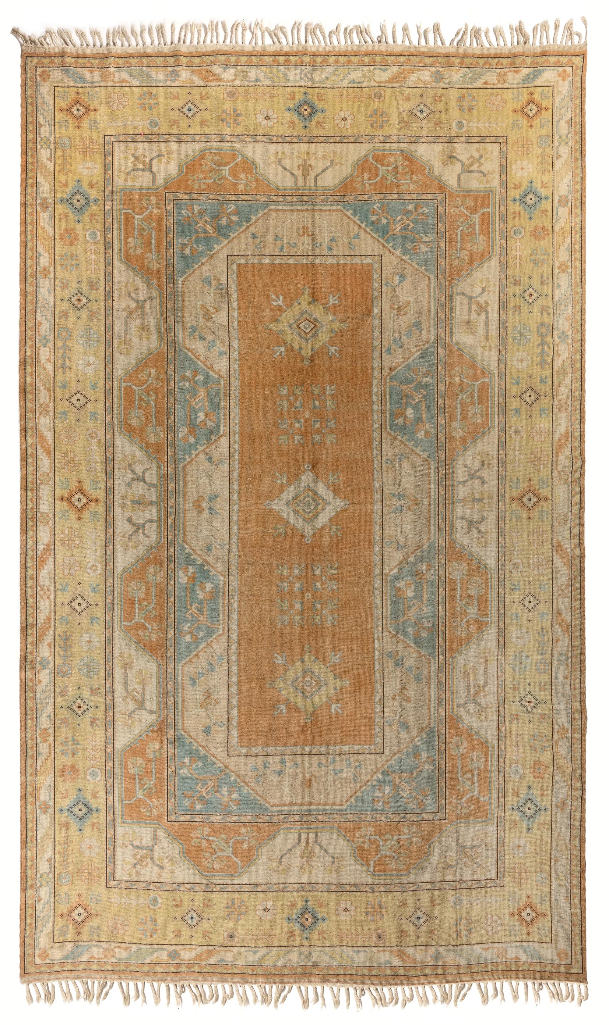 A finely hand knotted rug from the small town of Melas in South West Turkey that has been a famous rug making center, since 18th century.
This beautiful example is well drawn and in excellent condition. Soft medium wool pile on wool