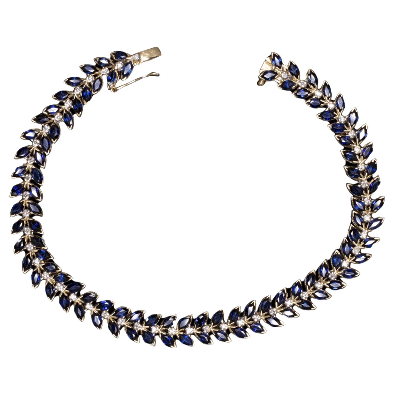 9.80  Bracciale in oro con zaffiro blu e diamanti