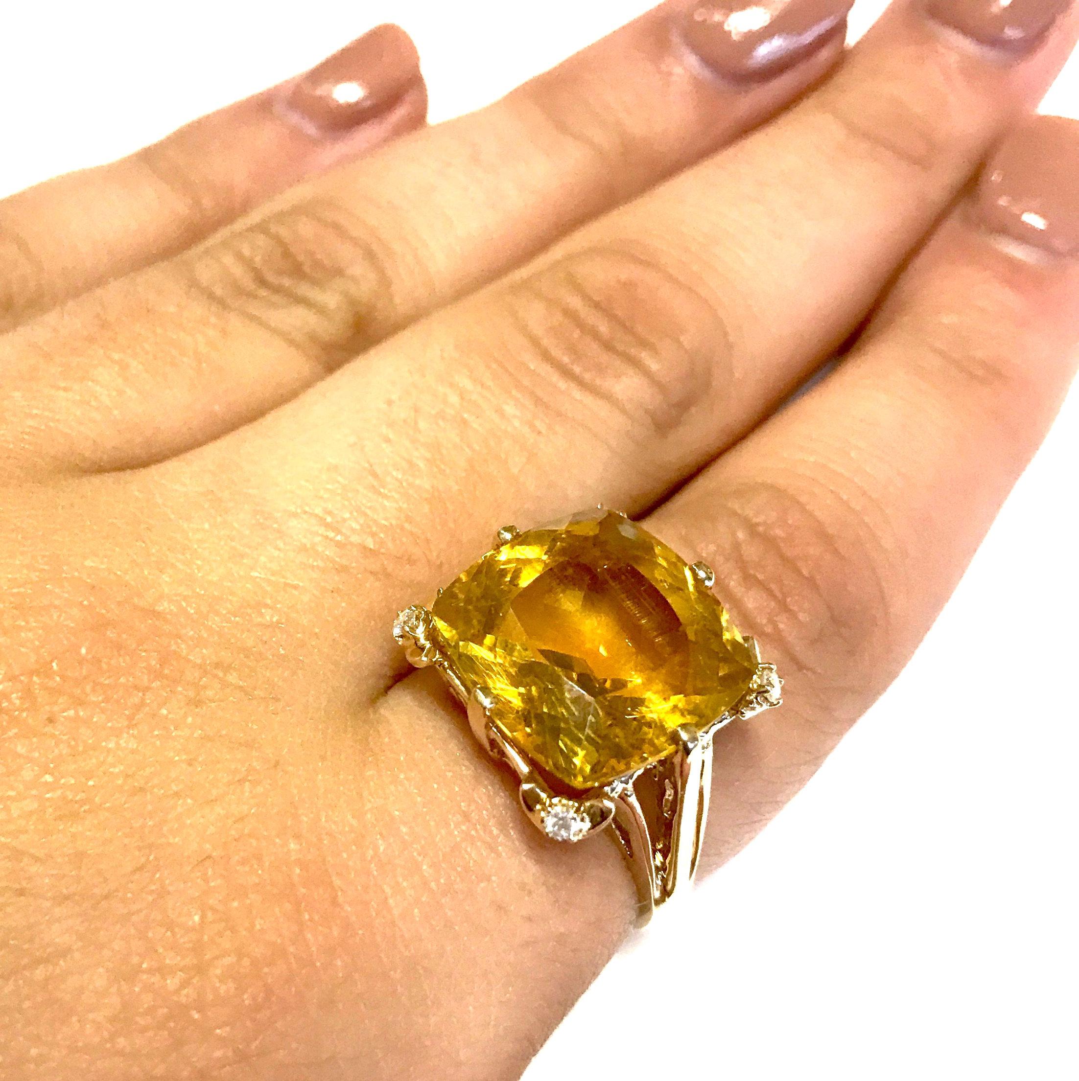 Yellow Beryl Ring - Cocktail Ring

Material: 14k Yellow Gold 
Center Stone Details: 9.80 Carat Cushion Cut Yellow Beryl - 14.3 x 14mm
Mounting Diamond Details: 4 Round White Diamonds Approximately 0.08 Carats - Clarity: SI / Color: H-I
Ring Size: