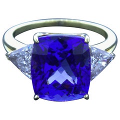 9,80 Karat Tansanit Diamant 18k Gelbgold 3-Stein-Ring