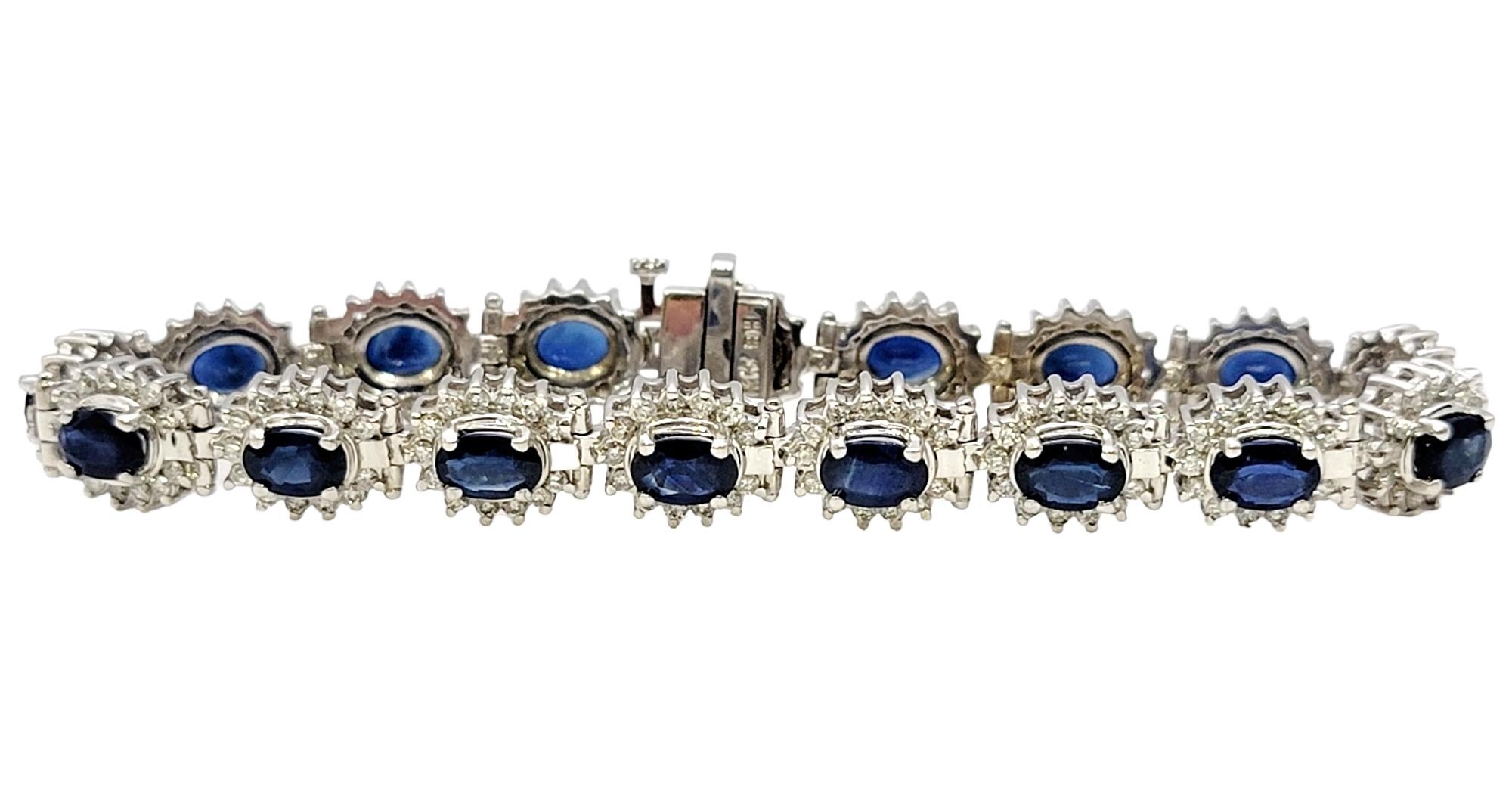 Oval Cut 9.80 Carat Total Natural Sapphire and Diamond Halo Line Bracelet in White Gold For Sale