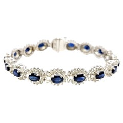 9.80 Carat Total Natural Sapphire and Diamond Halo Line Bracelet in White Gold