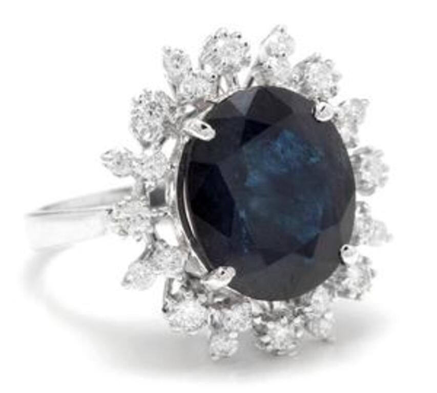 9.80 Carats Exquisite Natural Blue Sapphire and Diamond 14K Solid White Gold Ring

Total Blue Sapphire Weight is: Approx. 9.00 Carats

Sapphire Measures: Approx. 14.00 x 12.00mm

Sapphire Treatment: Diffusion

Natural Round Diamonds Weight: Approx.
