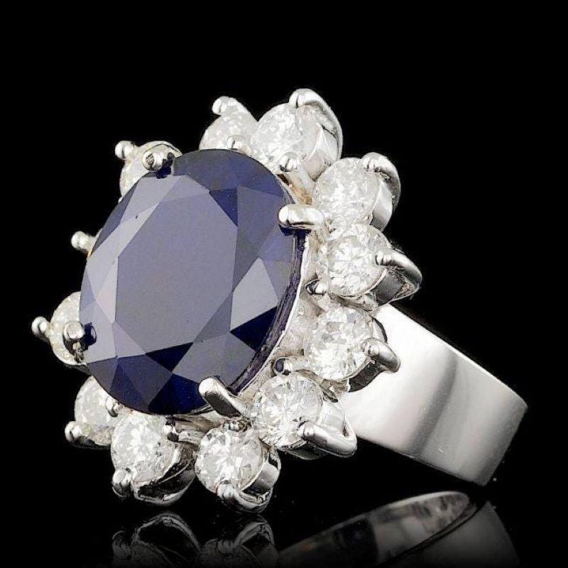 9.80 Carats Natural Sapphire and Diamond 14K Solid White Gold Ring

Total Natural Sapphire Weights: Approx. 7.80 Carats 

Sapphire Measures: Approx. 14.00 x 12.00mm

Sapphire treatment: Diffusion

Natural Round Diamonds Weight: Approx. 2.00 Carats