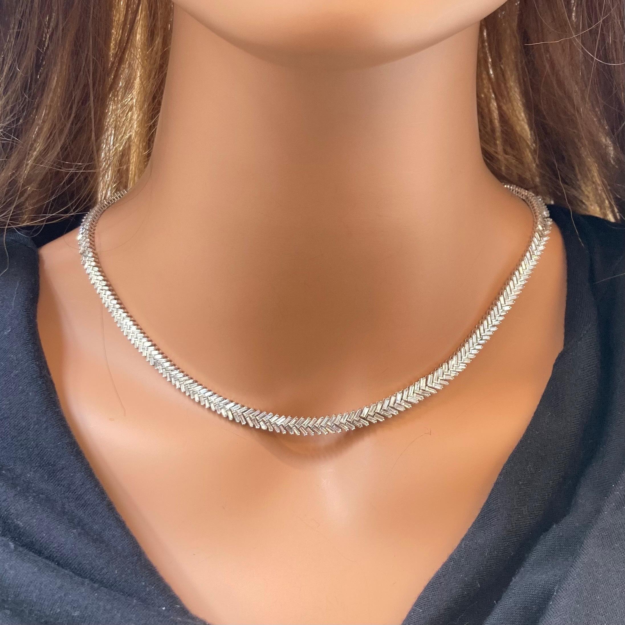 Elevate your ensemble to new heights with this breathtaking 9.82 carat Baguette Diamond Necklace, a masterpiece of luxury and sophistication. Crafted in radiant 18k white gold, this necklace exudes opulence at every turn. Each meticulously selected